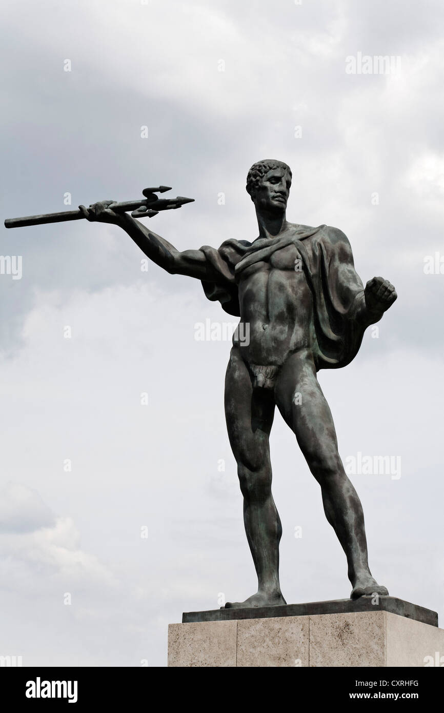 Neptune or Poseidon throwing a trident, monumental statue from the 1920's, Duesseldorf, North Rhine-Westphalia, Germany, Europe Stock Photo