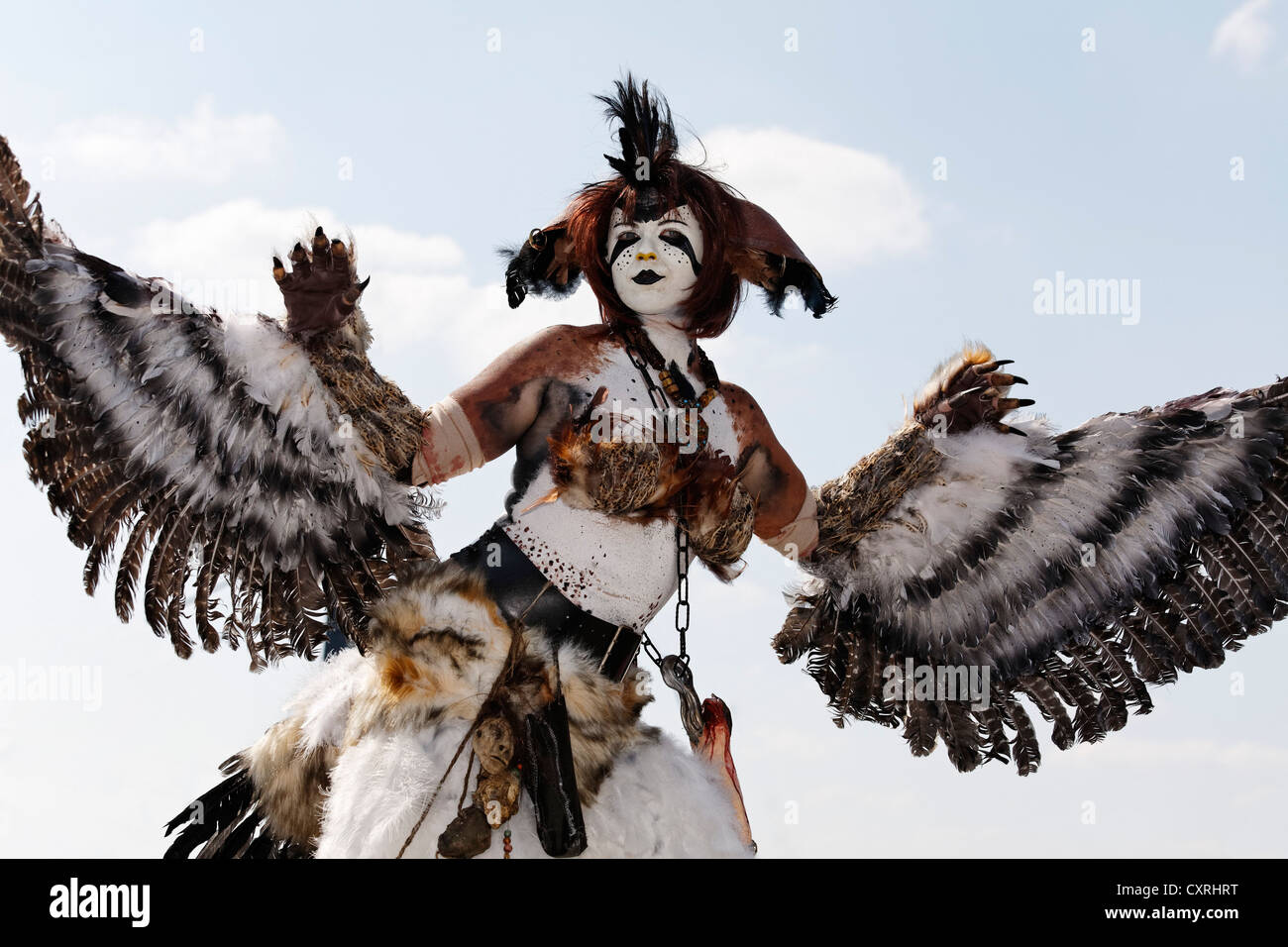 Cosplayer dressed as a bird of prey, flapping their wings, Japan Day ...