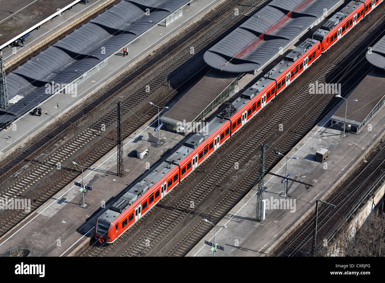 Local train stopping at Koeln-Deutz station, as seen from Koelntriangle office tower, Cologne, North Rhine-Westphalia Stock Photo