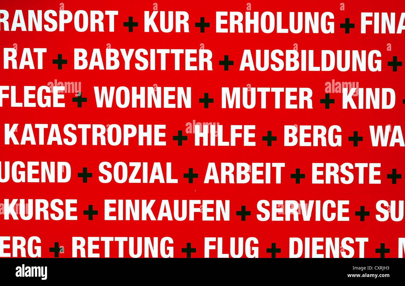 Keywords, white lettering on red, on an used clothes container, Berlin, Germany, Europe Stock Photo