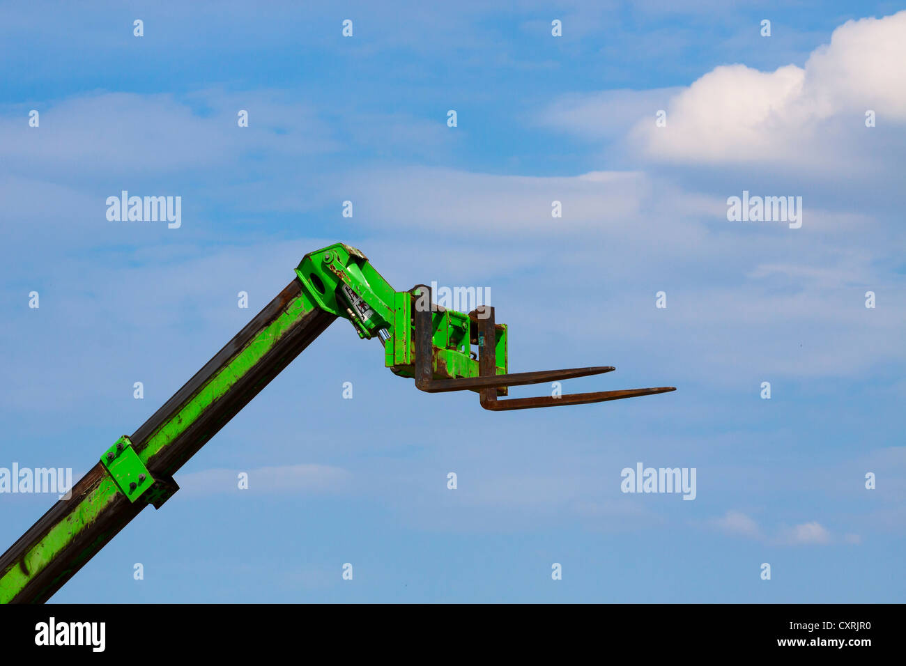 Forklift truck against a blue sky, Berlin, Germany, Europe Stock Photo