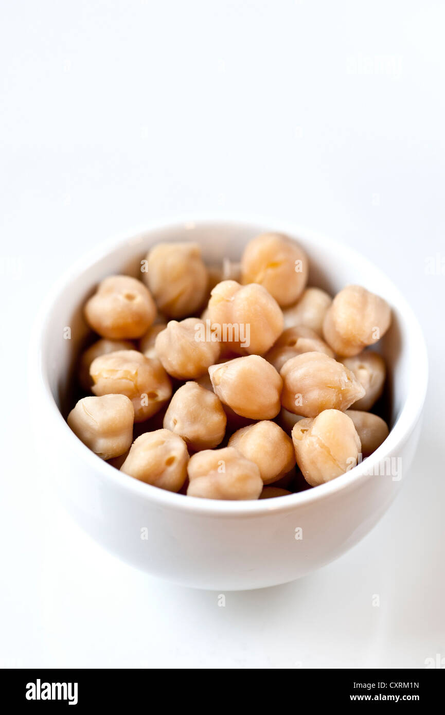 Cooked chickpeas in a white bowl Stock Photo