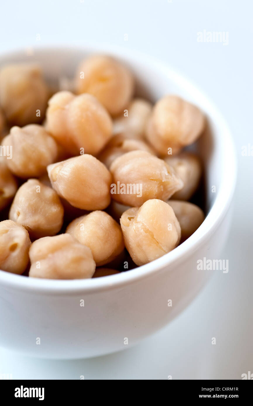 Cooked chickpeas in a white bowl Stock Photo