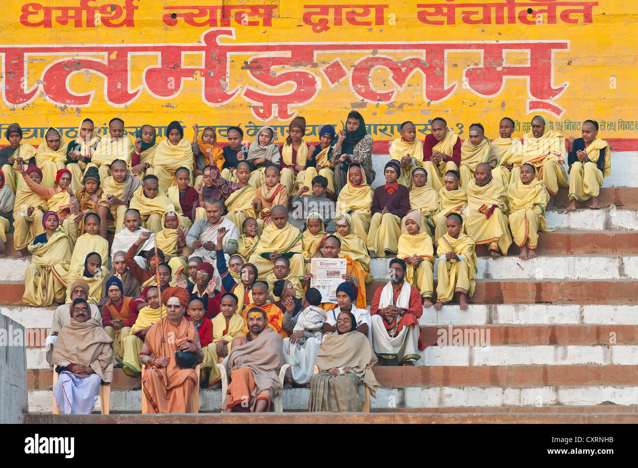 Hindu teacher with students, Ghats, steps at the Ganges, Varanasi