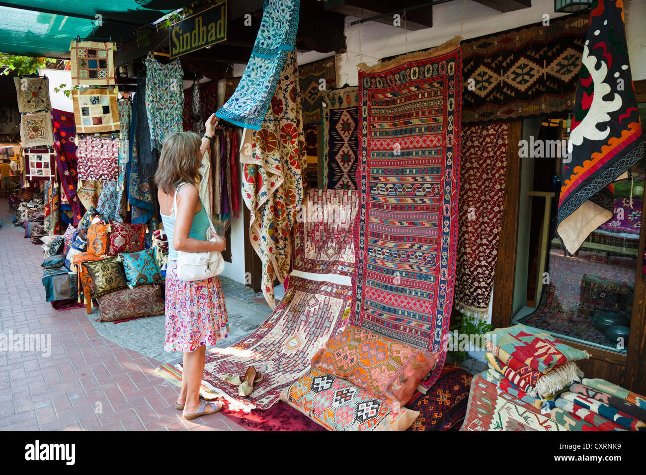Woman on a bazaar in the historic district of Fethiye, Lycian coast, Lycia, Turkey Stock Photo