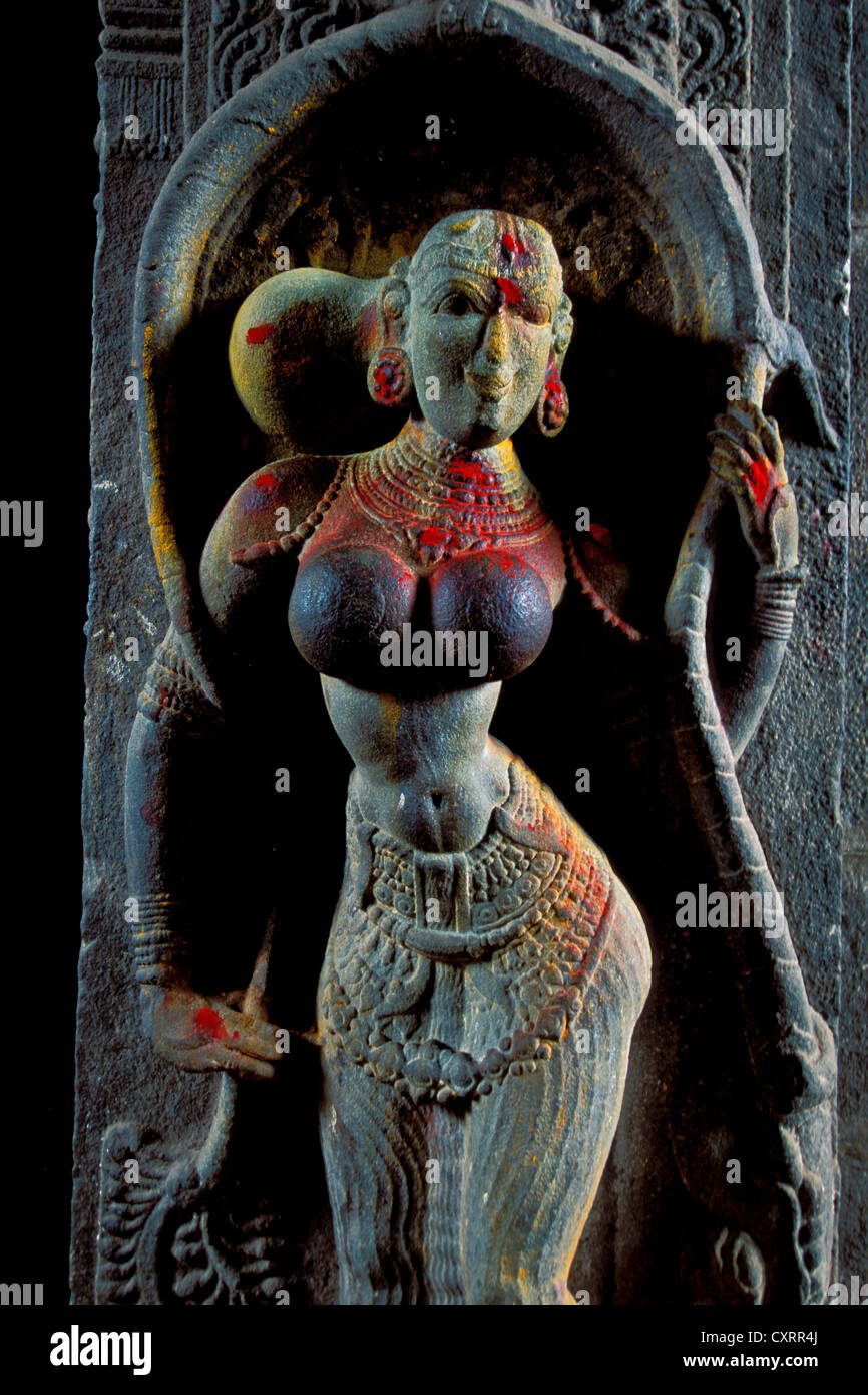 Sculpture of a woman decorated with kumkum powder, entrance of Minakshi, Meenakshi or Sri Meenakshi-Sundareshwara Temple Stock Photo