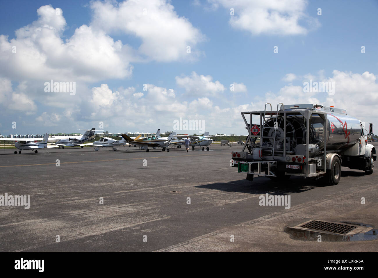 avfuel aviation fuel supply truck and range of private aircraft at small key west international airport florida keys usa Stock Photo