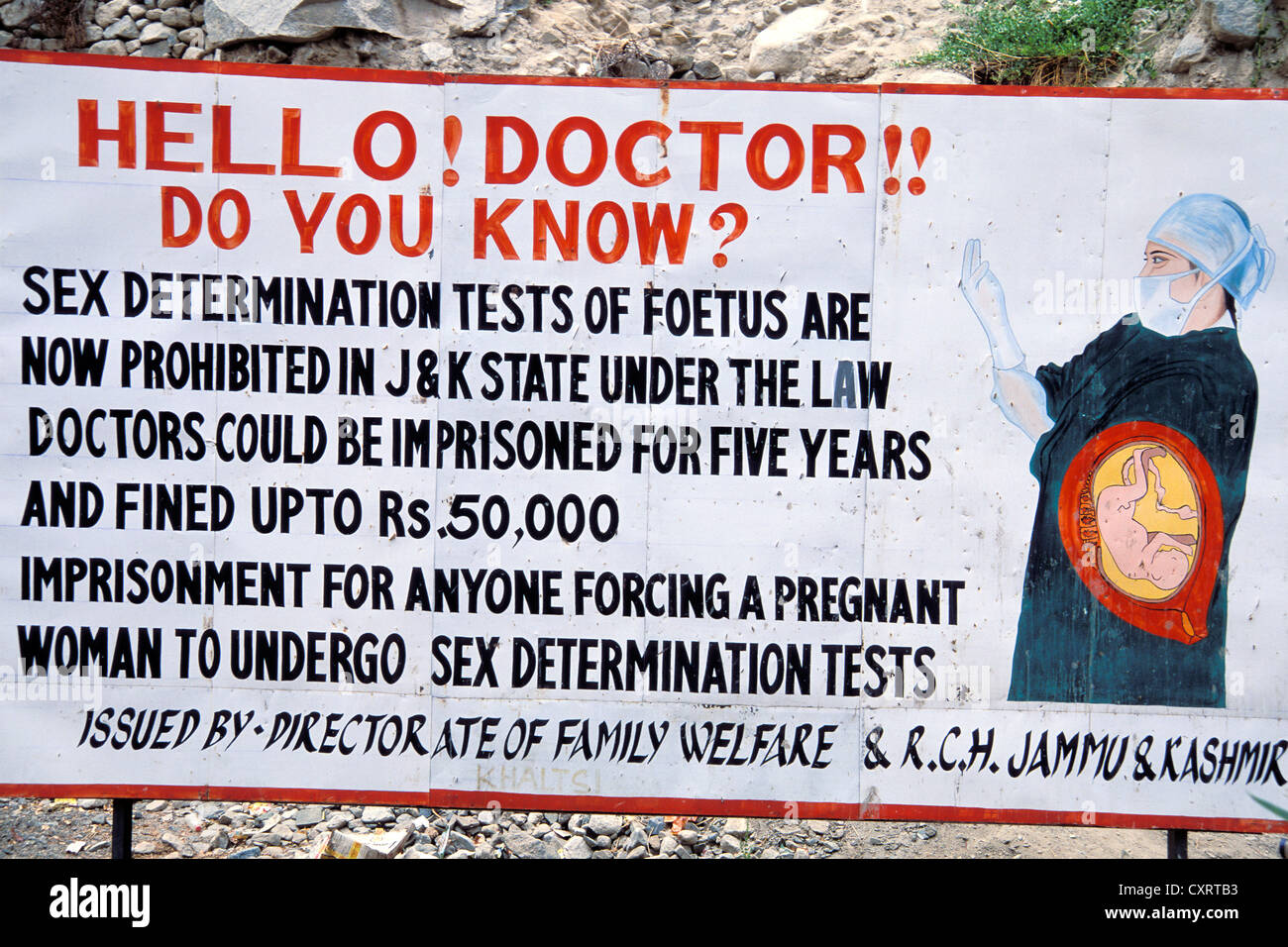 Text panel warning doctors against pre-natal sex determination, an initiative to prevent the abortion of girls, Tikse Stock Photo