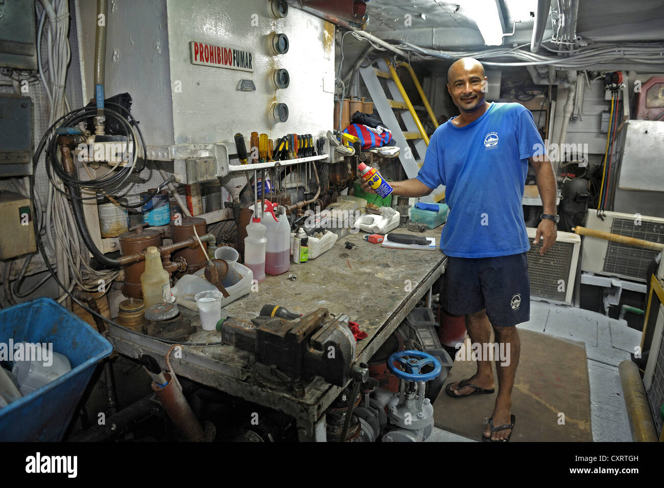 Workbench and the machinist in the engine room of a ship, Okeanoss Aggressor, Costa Rica, Central America Stock Photo