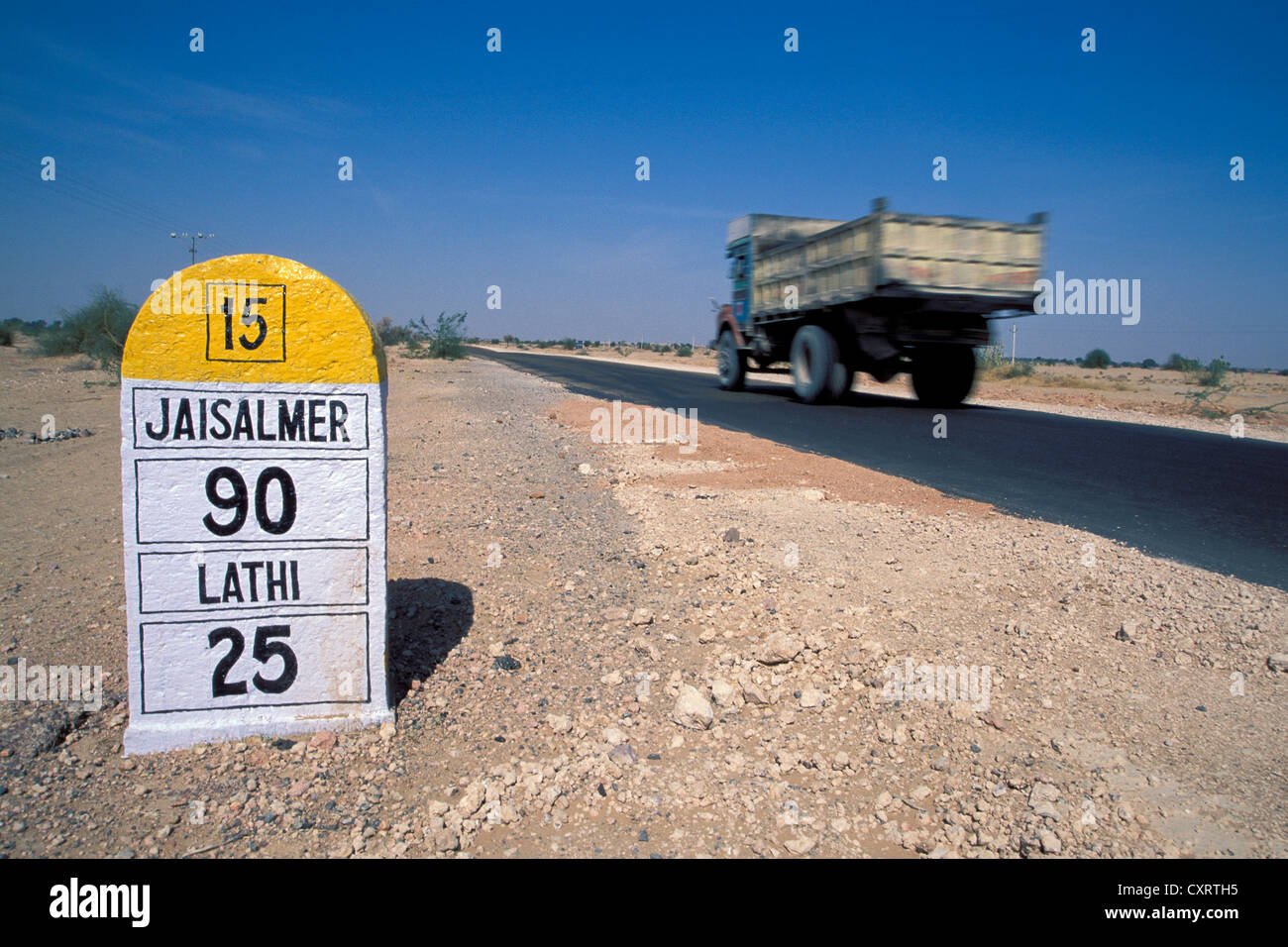 Road sign, milestone on the roat to Jaisalmer, Thar Desert, Rajasthan, India, Asia Stock Photo