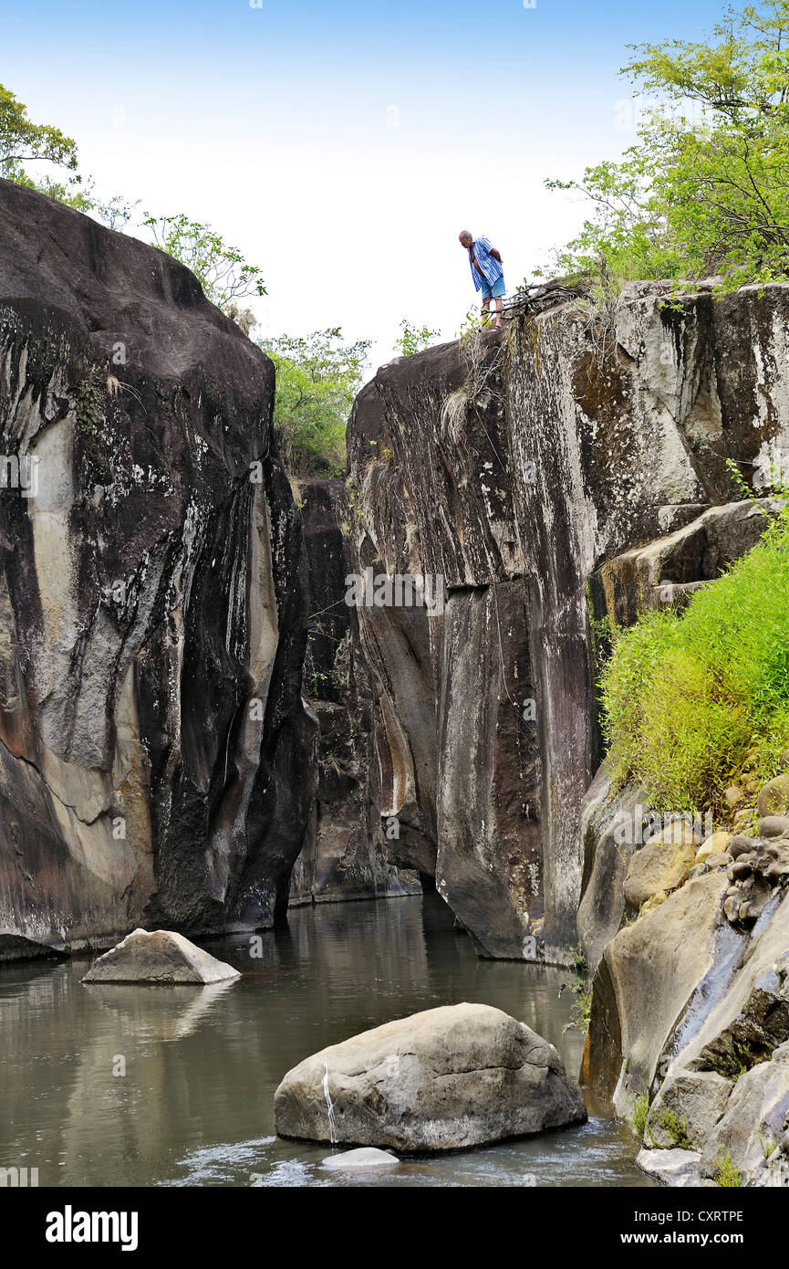 Tourists at a gorge with a river near Liberia, Guanacaste province, Costa Rica, Central America Stock Photo