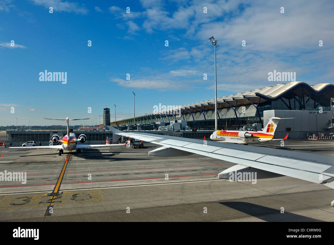 Madrid Airport, terminal, tower and aircrafts of the airline Iberia, Spain, Europe Stock Photo