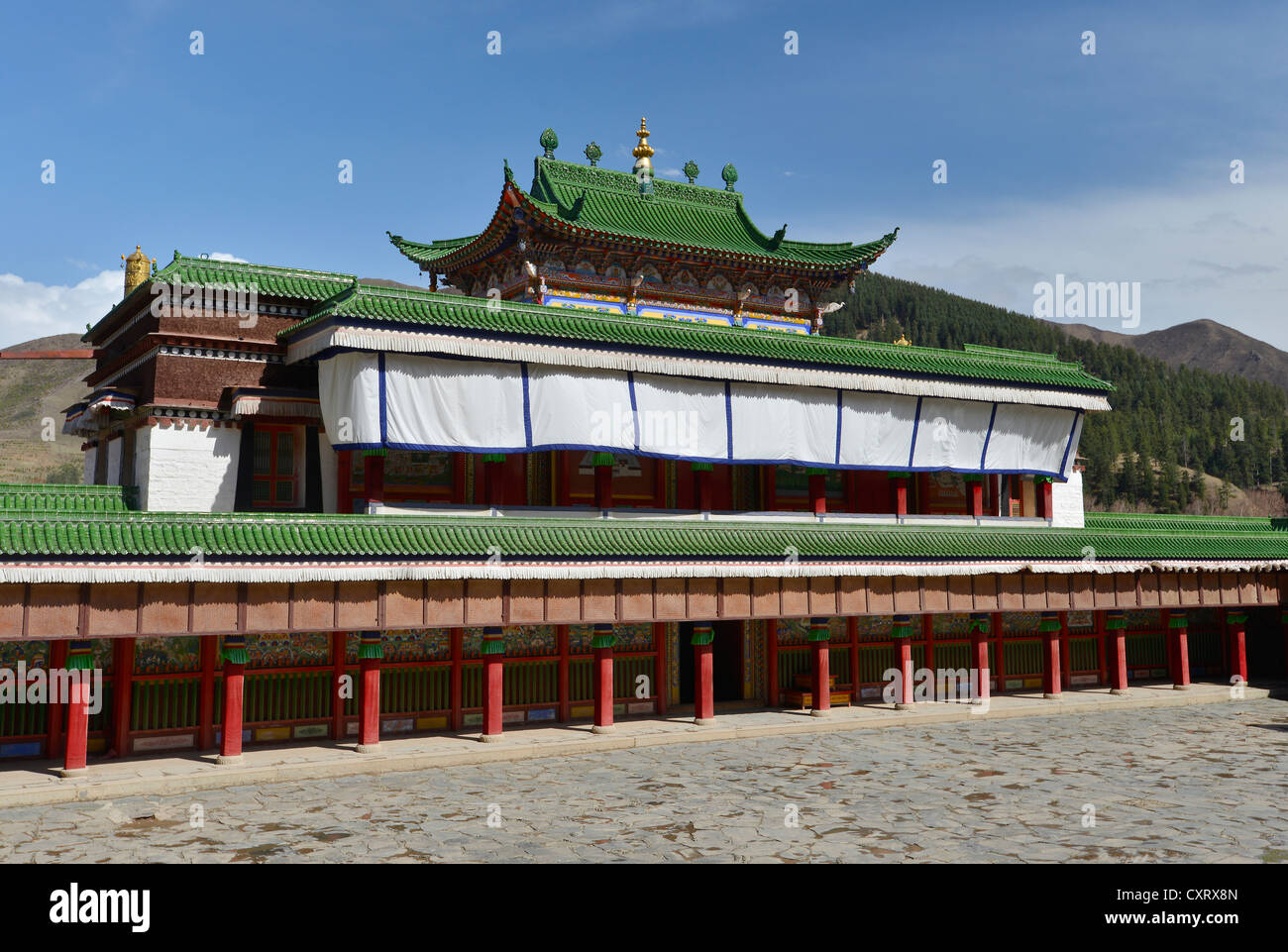 Tibetan Buddhism, monastery buildings built in the traditional Tibetan style, with green Chinese roof shingles and components Stock Photo