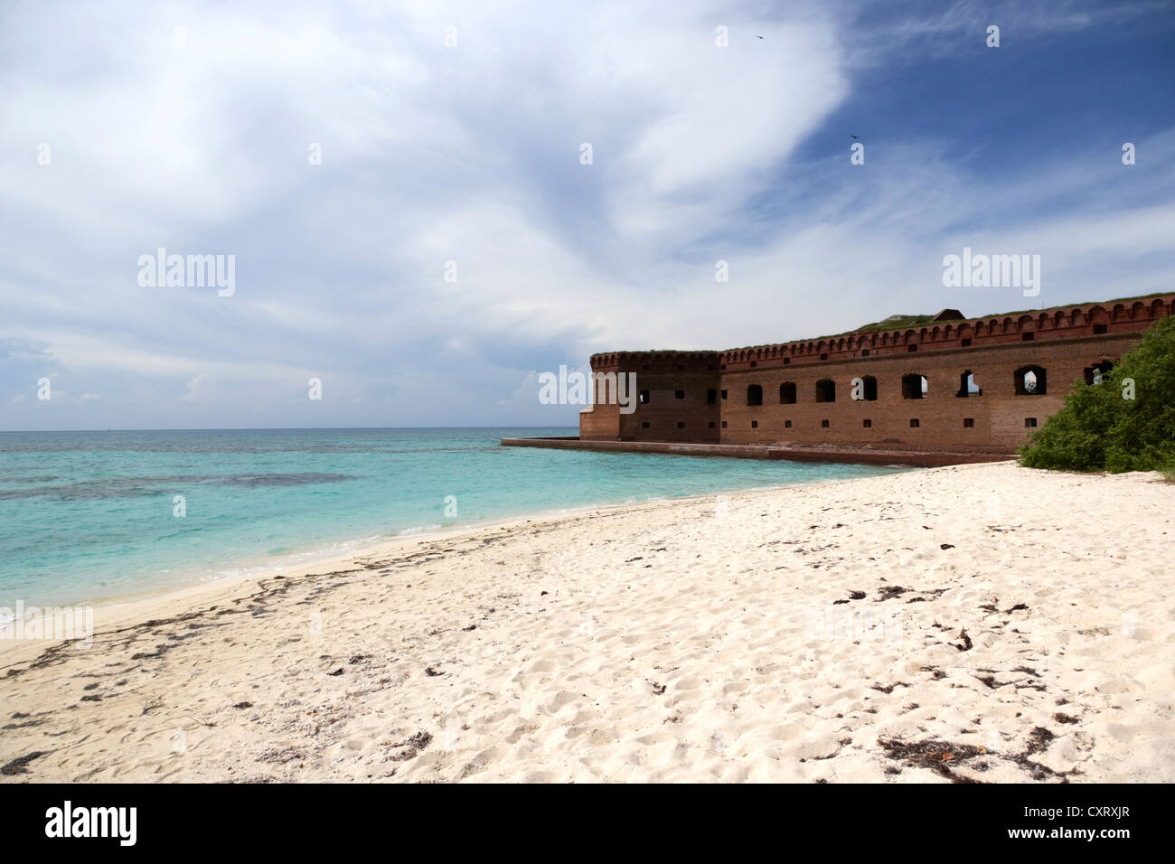 beach in front of fort jefferson brick walls with moat dry tortugas national park florida keys usa Stock Photo