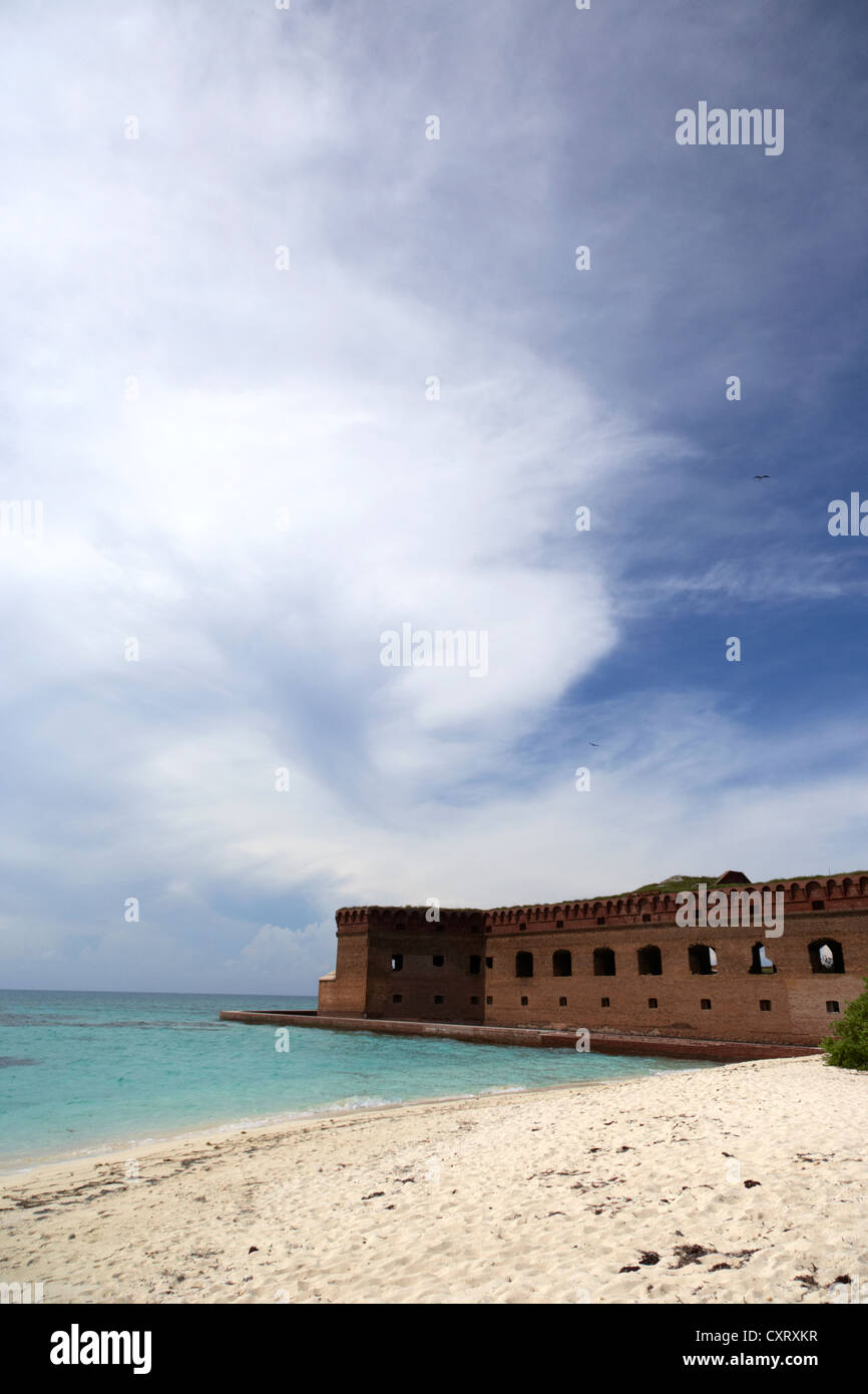 beach in front of fort jefferson brick walls with moat dry tortugas national park florida keys usa Stock Photo