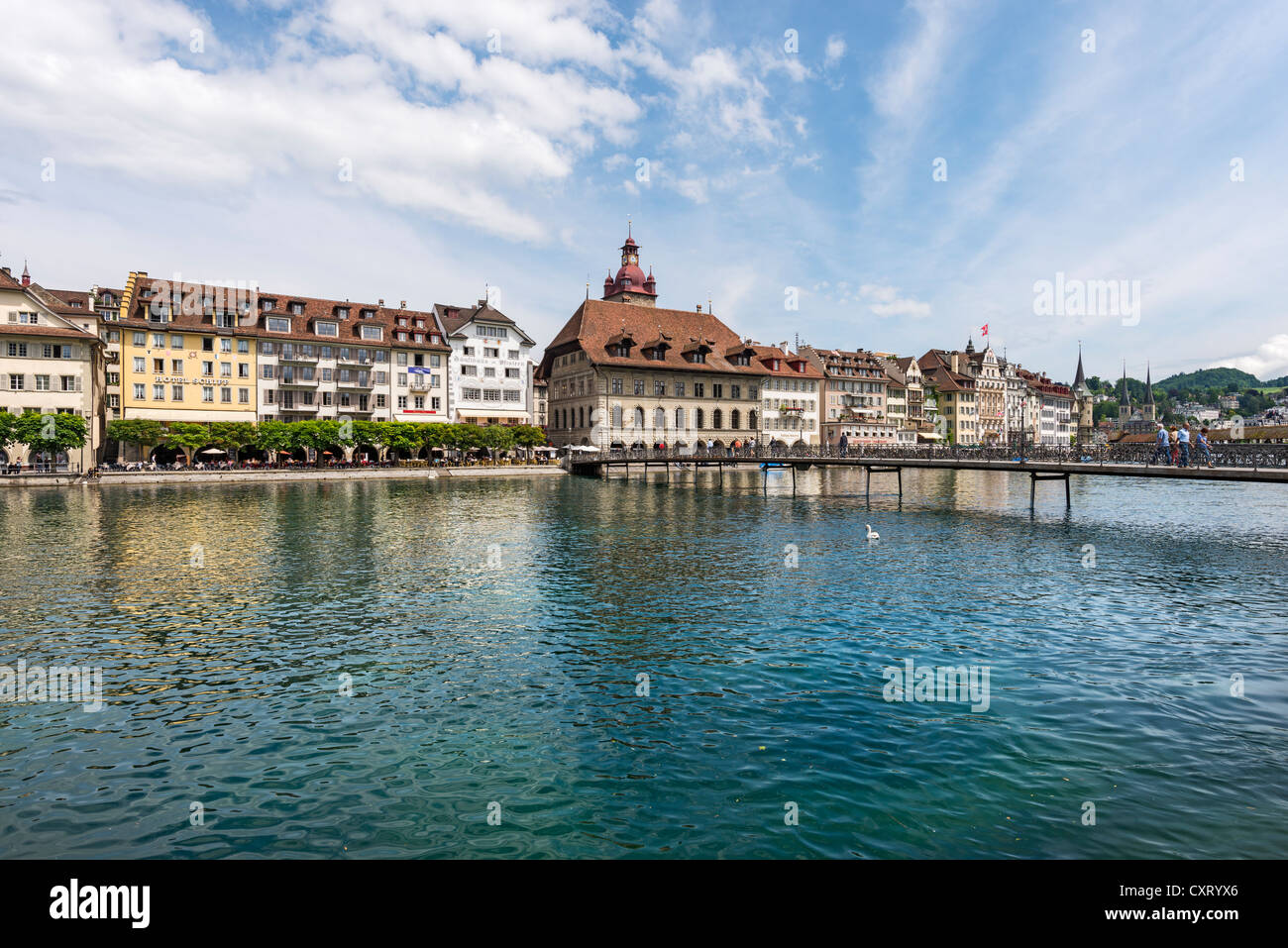 View across the Reuss river, historic disrict of Lucerne and the town hall, Rathaussteg bridge in the foreground, Lucerne Stock Photo