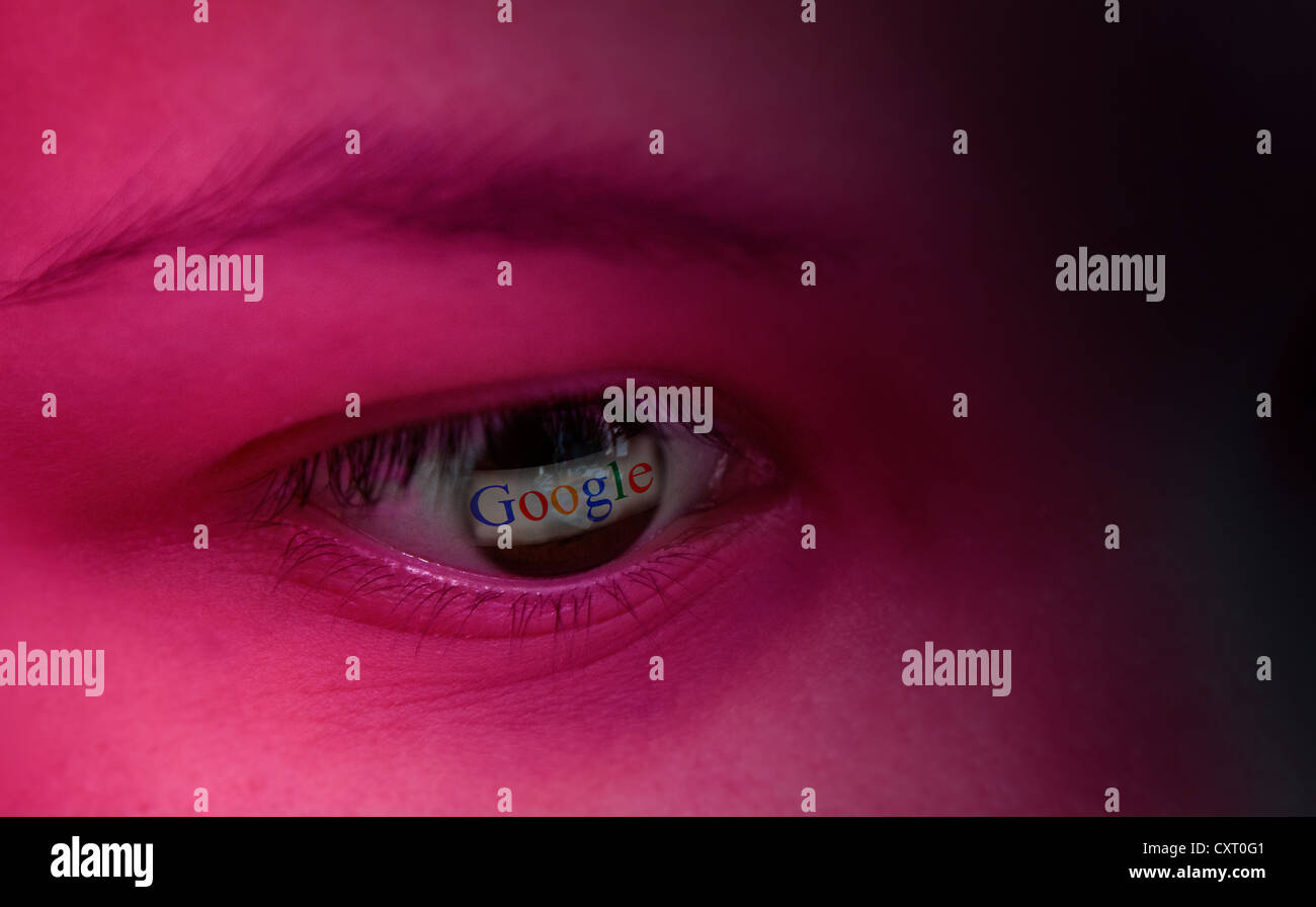 The Google logo is reflected in an eye, symbolic image Stock Photo - Alamy