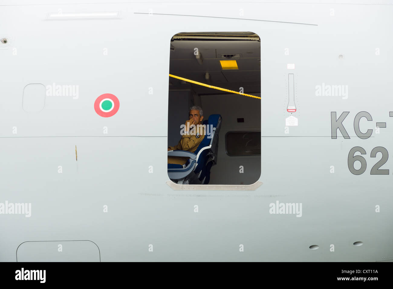 Well Rested Pilot The pilot of the plane is resting Stock Photo - Alamy
