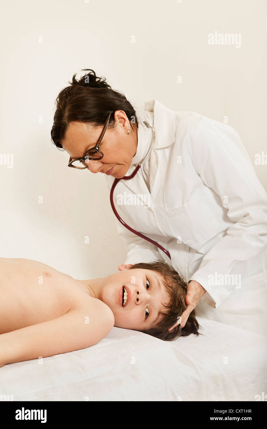 Boy being examined by a pediatrician Stock Photo