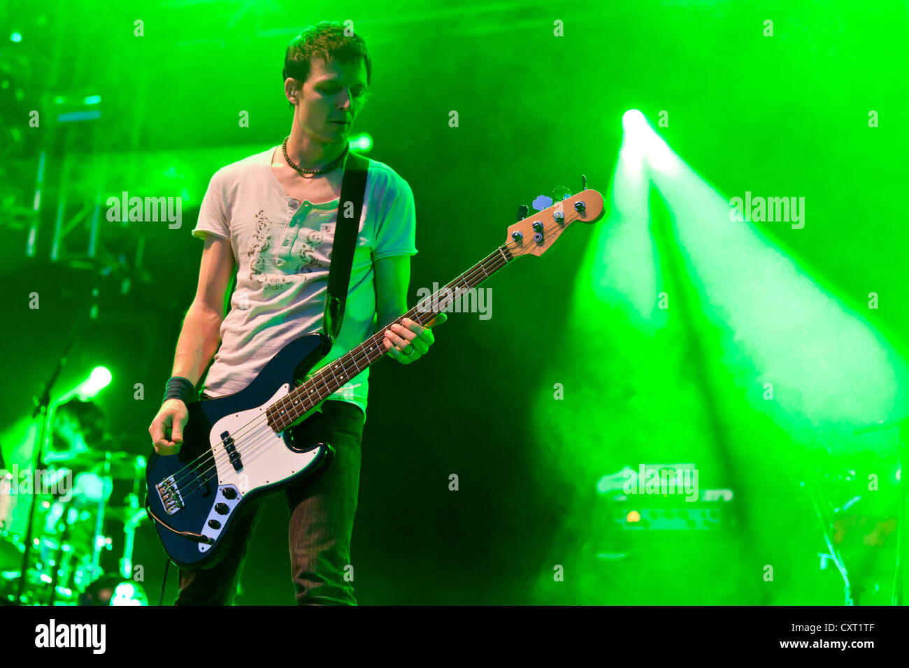 Florian Senn, bass guitarist of the Swiss pop band Lovebugs playing live at the Soundcheck Open Air in Sempach-Neuenkirch Stock Photo