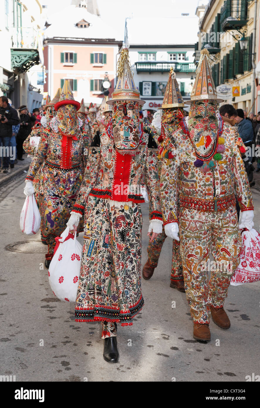 People wearing Flinserl costumes, spring figures of the Ausseer carnival, Carnival in Bad Aussee, Ausseerland, Salzkammergut Stock Photo
