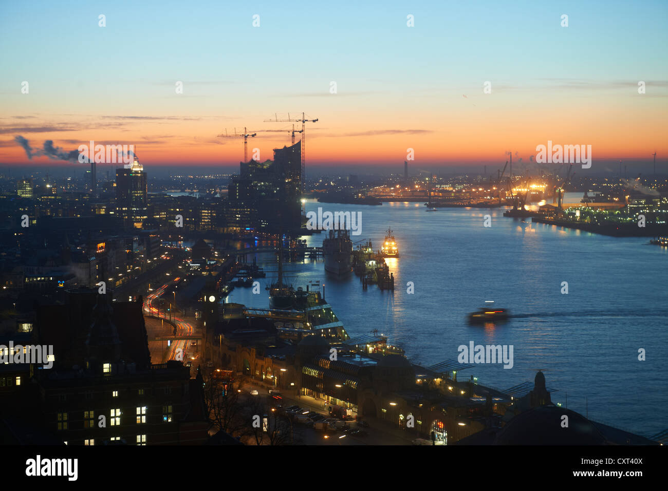 Port of Hamburg with views to the Elbe Philharmonic Hall at sunrise, Hamburg, Germany, Europe Stock Photo