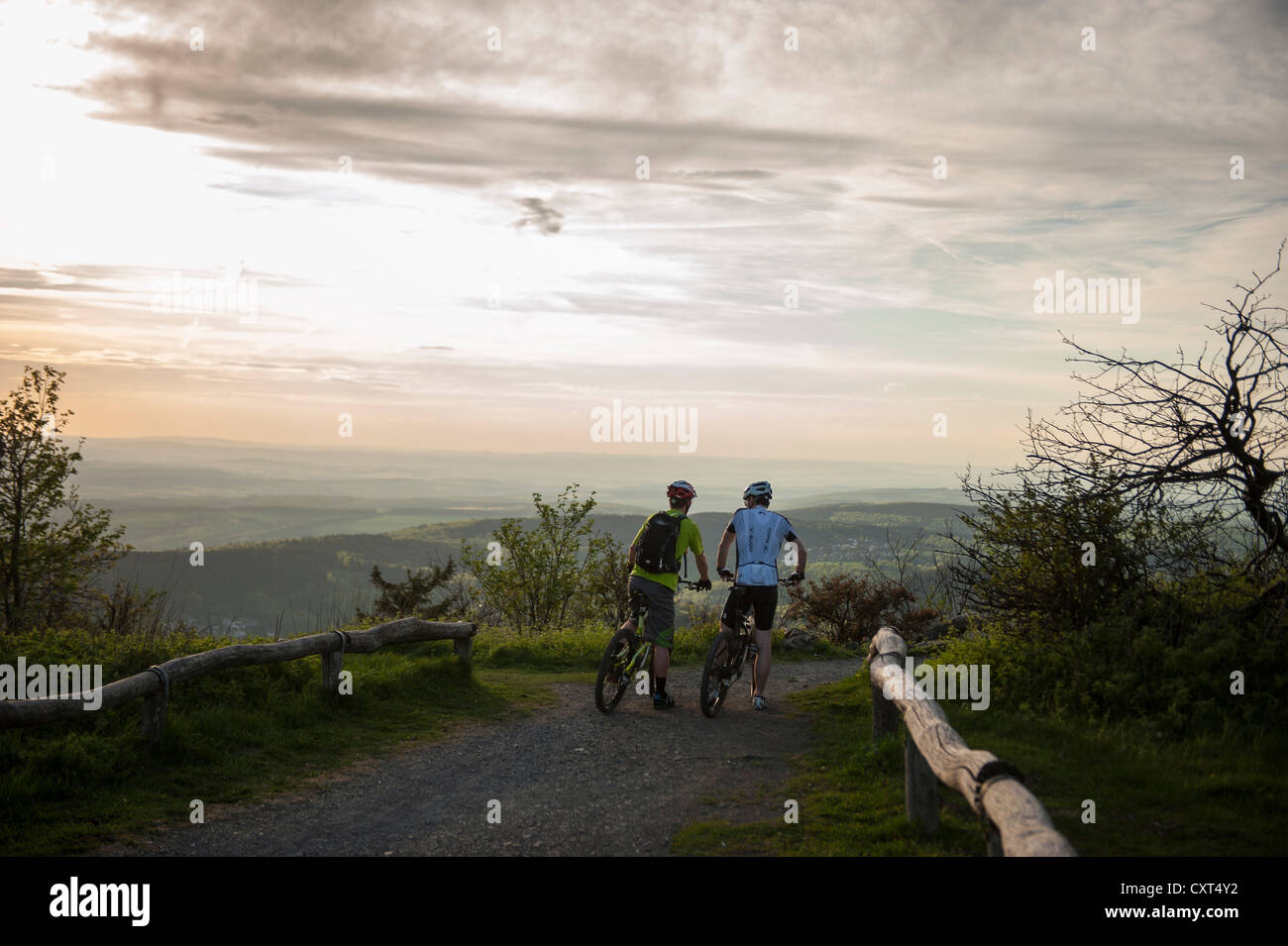 Cyclists, evening mood, Mt Grosser Feldberg, Niederreifenberg, Hesse, Germany, Europe Stock Photo