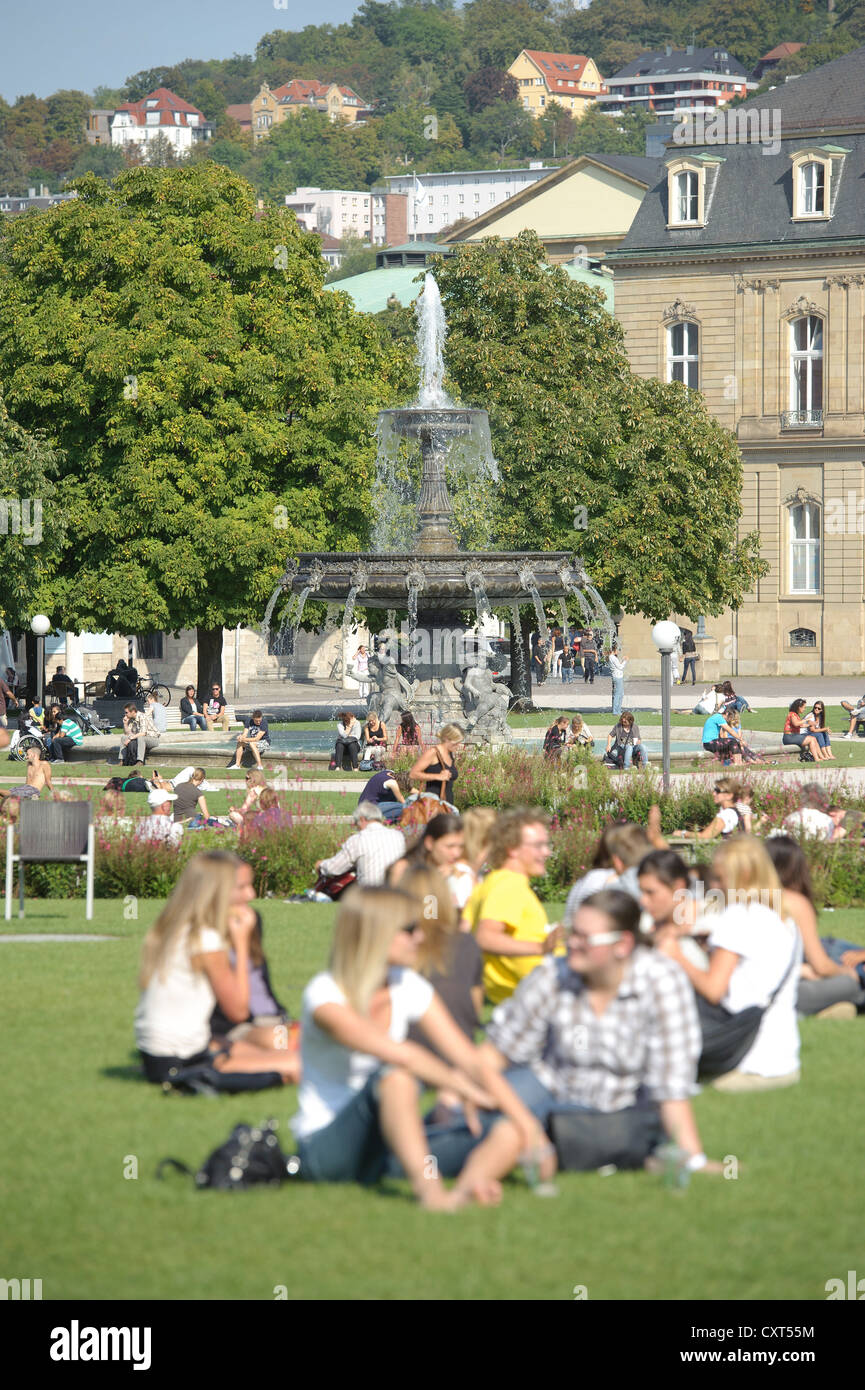 People sitting on Schlossplatz square, fountain, Stuttgart, Baden-Wuerttemberg, Germany, Europe Stock Photo