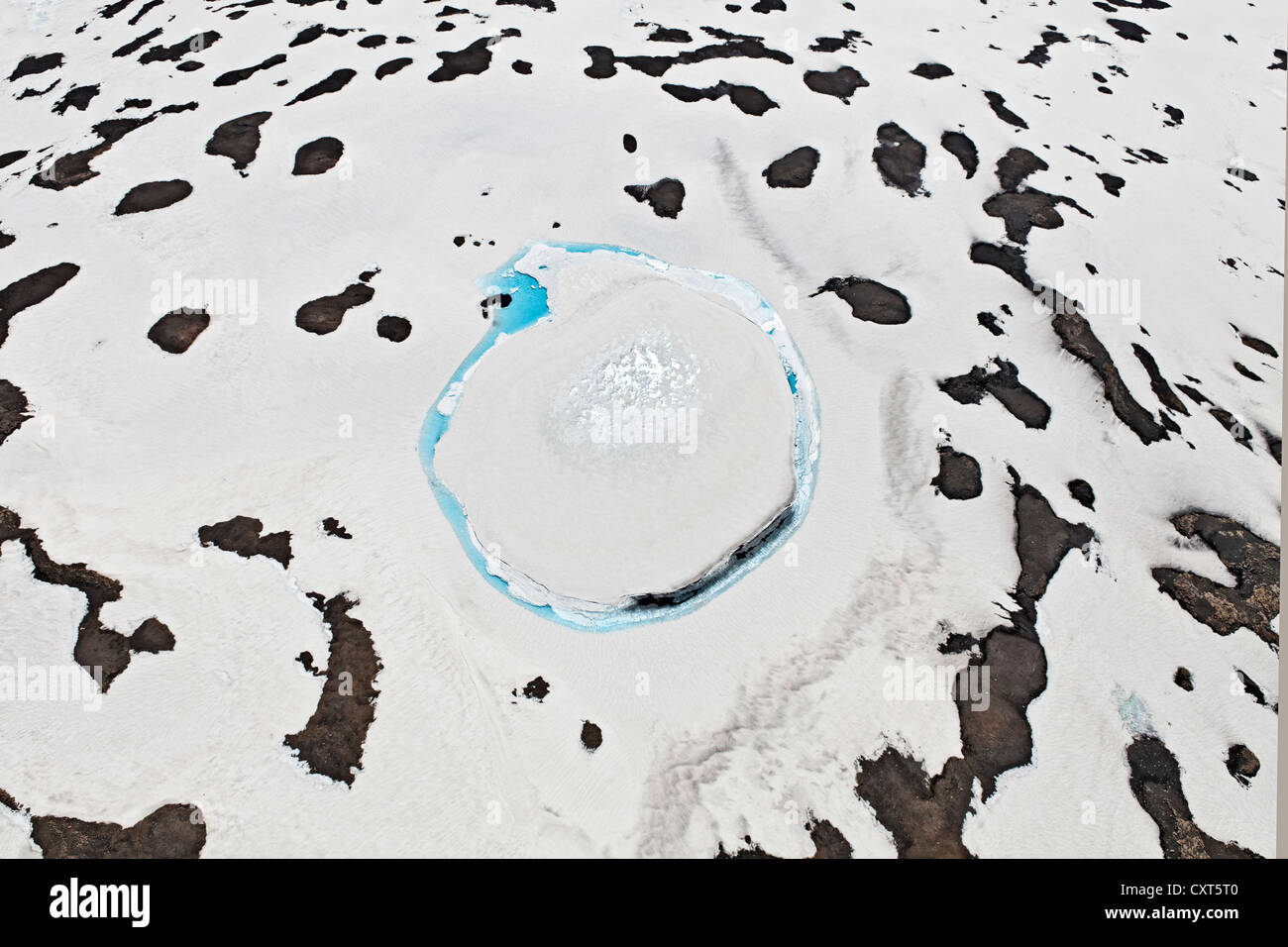 Aerial view, a circle of blue melted water in the ice of Langjoekull Glacier, Iceland, Europe Stock Photo