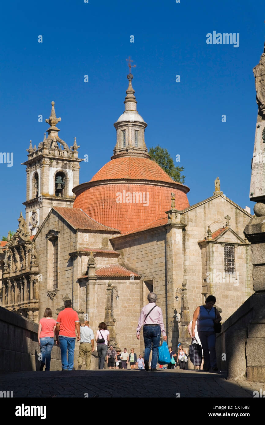 Tourists crossing the bridge leading to the Saint-Gonçalo monastery, Amarante, Portugal, Europe Stock Photo