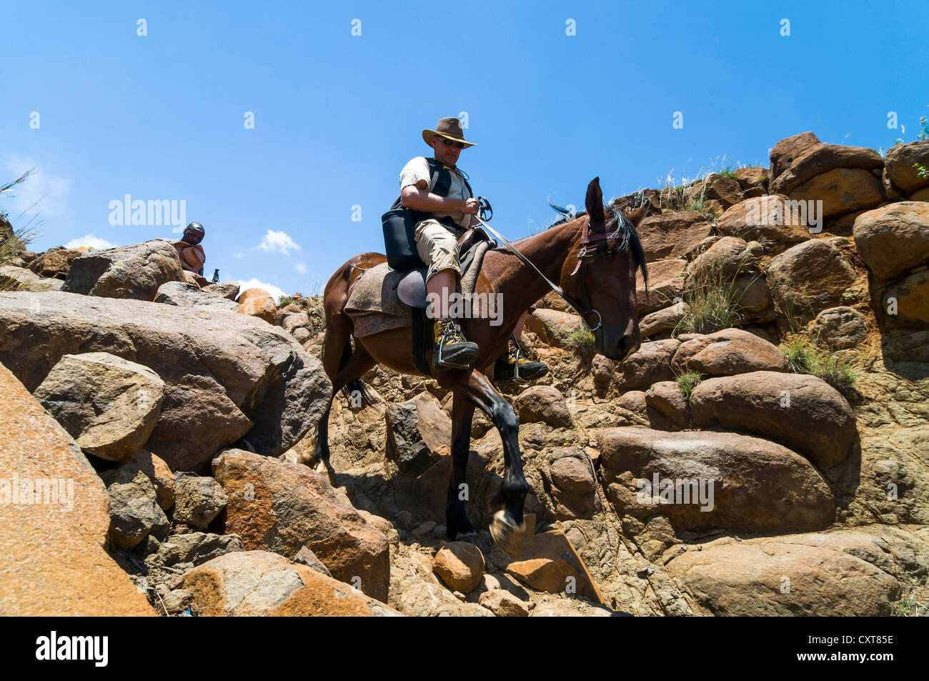 Man on horseback, Highlands, Kingdom of Lesotho, Africa Stock Photo
