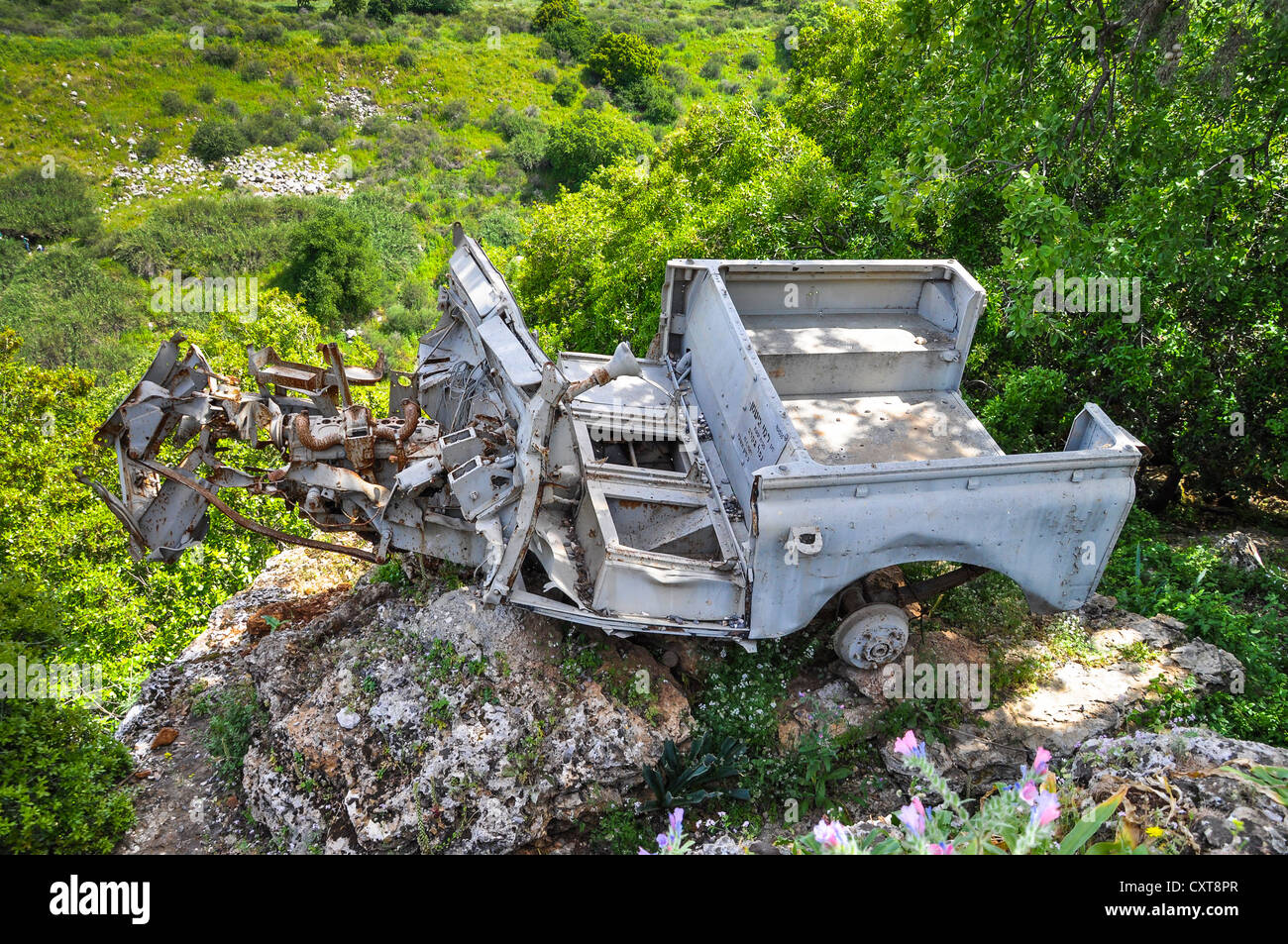 Wreckage of an all-terrain vehicle as a memorial to the Six Day War, Banyas, Banias or Banjas Nature Reserve, Israel Stock Photo