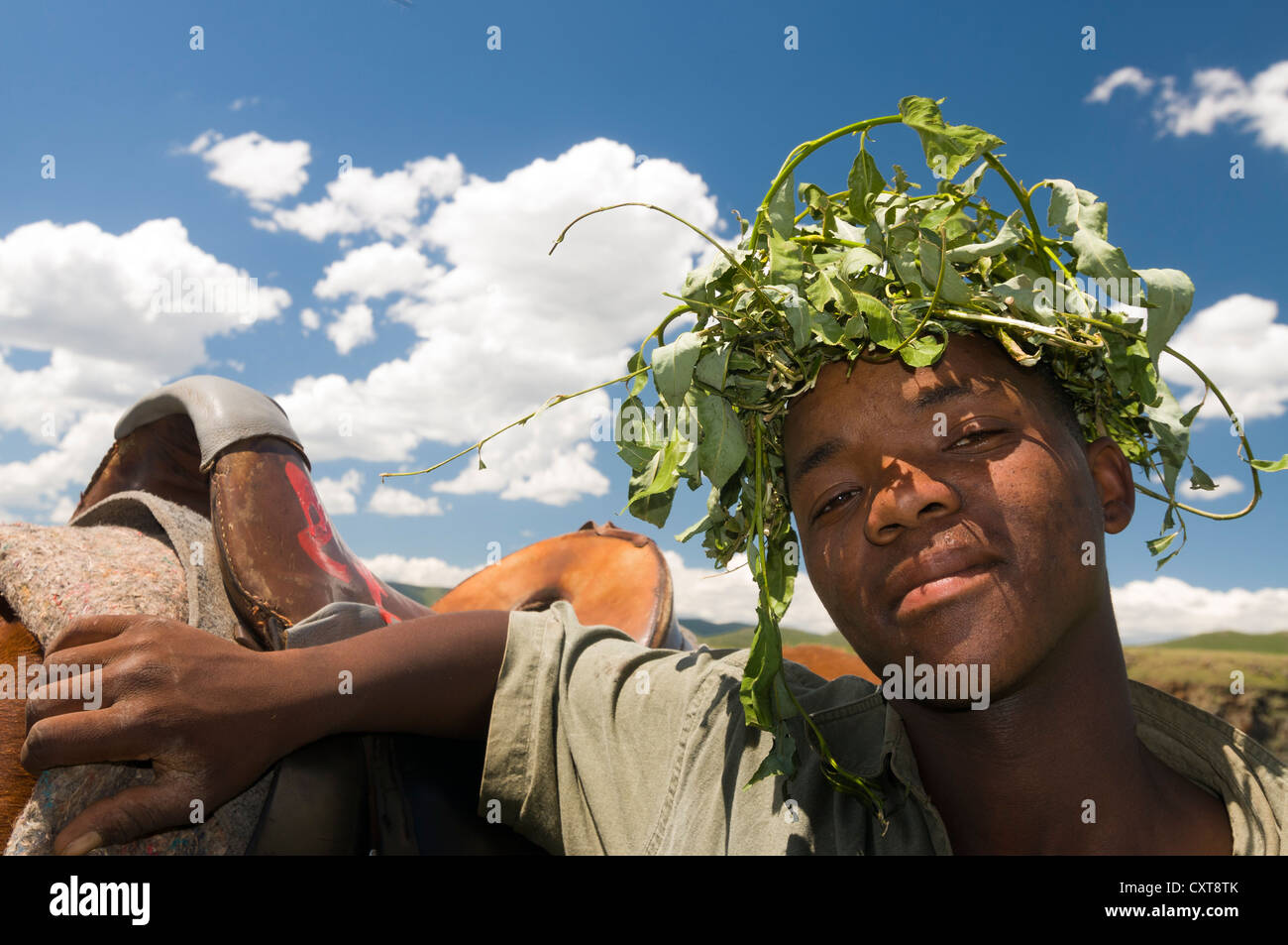 Young Basotho man with his horse, Drakensberg, Kingdom of Lesotho, southern Africa Stock Photo