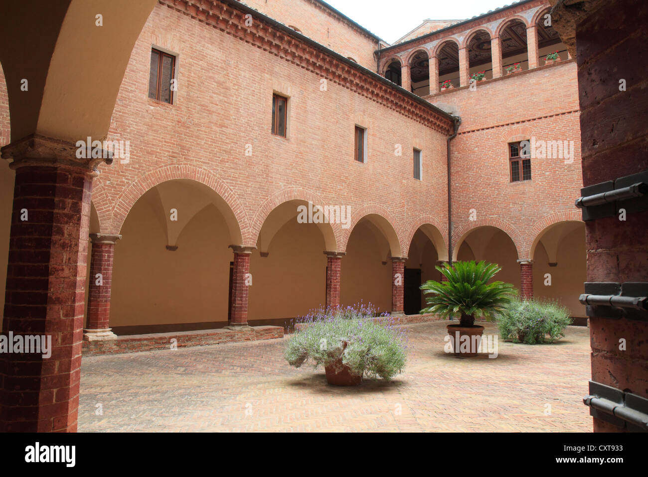 Courtyard of Abbazia di Monte Oliveto Maggiore Abbey, Tuscany, Italy, Europe Stock Photo