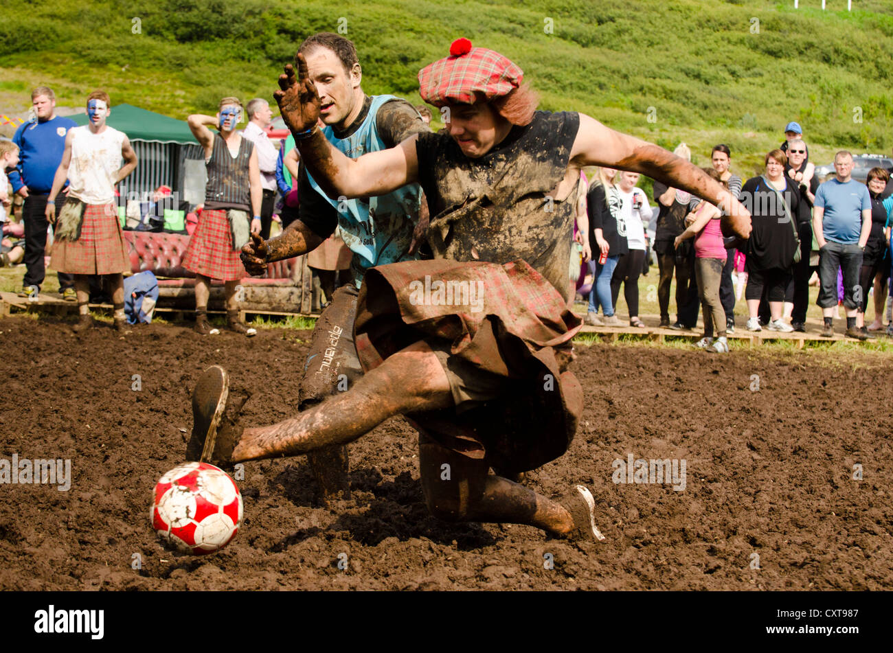 Young people playing mud-soccer, European championship, town of Isafjordur, West Fjords, Iceland, Europe Stock Photo