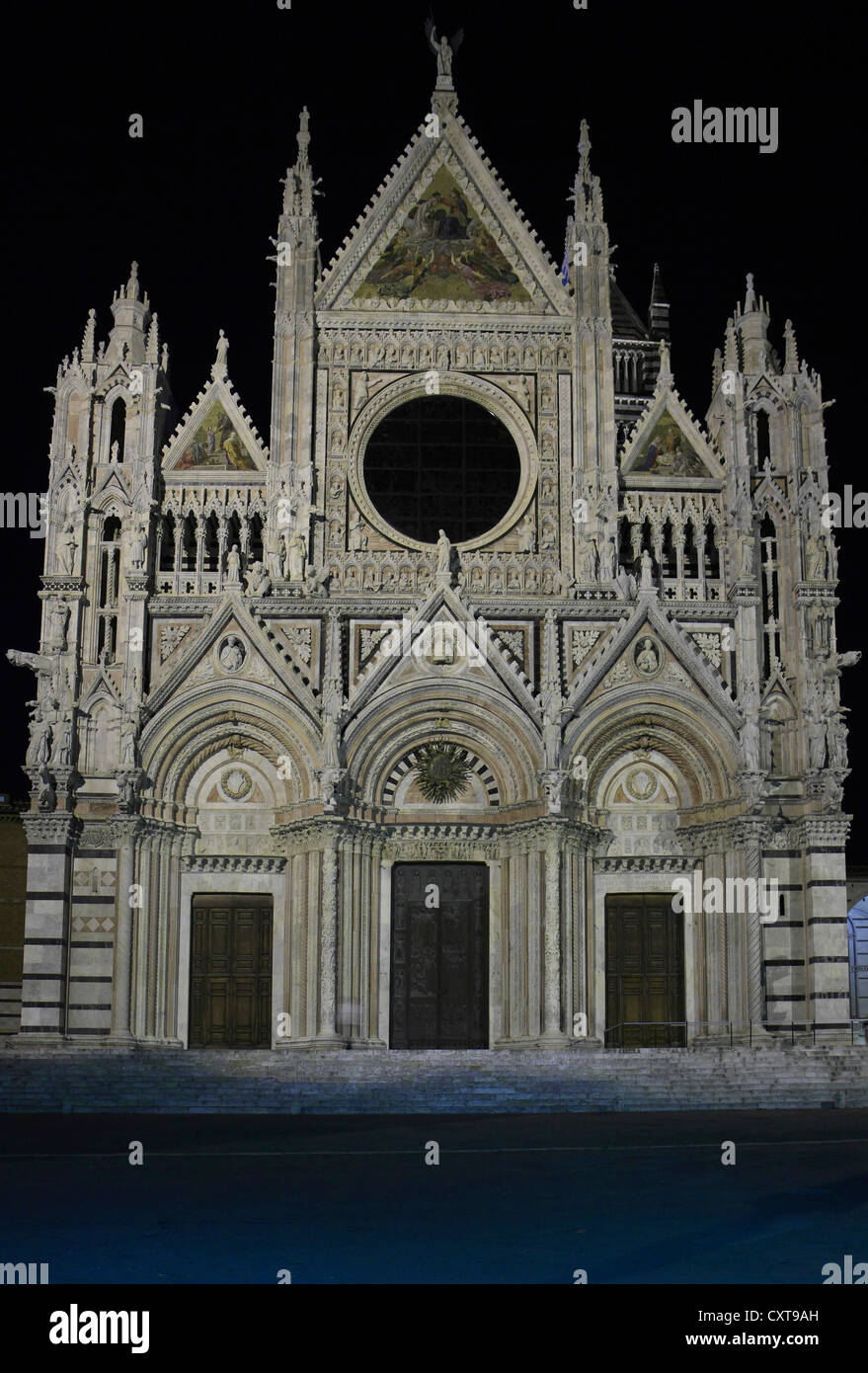 Main facade by Giovanni Pisano, Siena Cathedral, Cathedral of Santa Maria Assunta at night, Siena, Tuscany, Italy, Europe Stock Photo