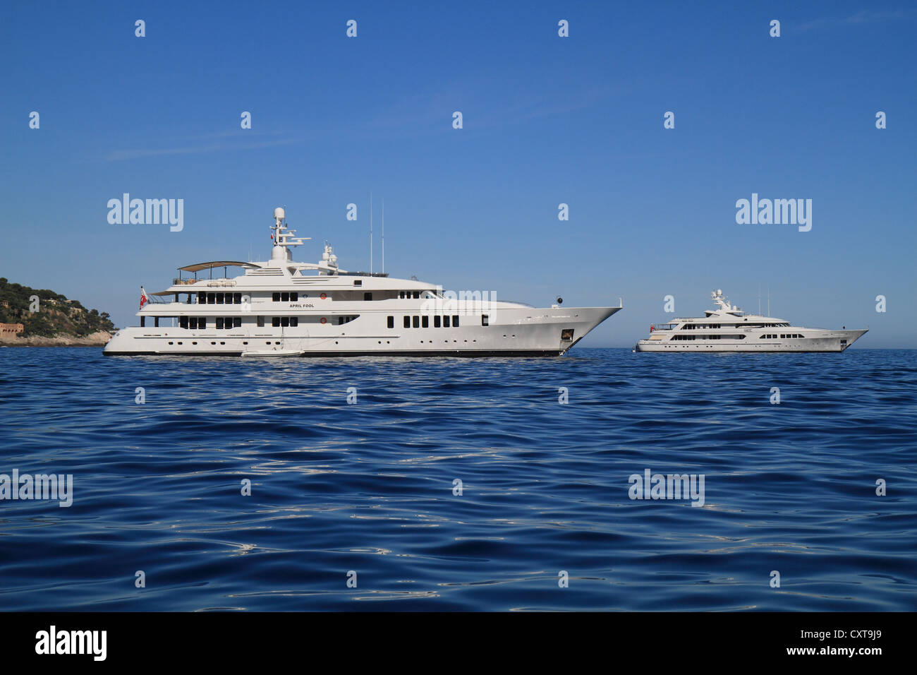 Motor yachts, April Fool, built by Feadship, length 60.96 metres, built in 2006, and Majestic, built by Feadship Stock Photo