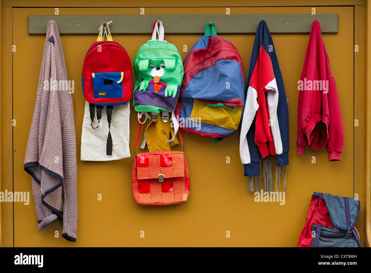 School wardrobe with backpacks, bags, jackets at the Easter bunny school at Easter time, Niederneuching-Ottenhofen Stock Photo