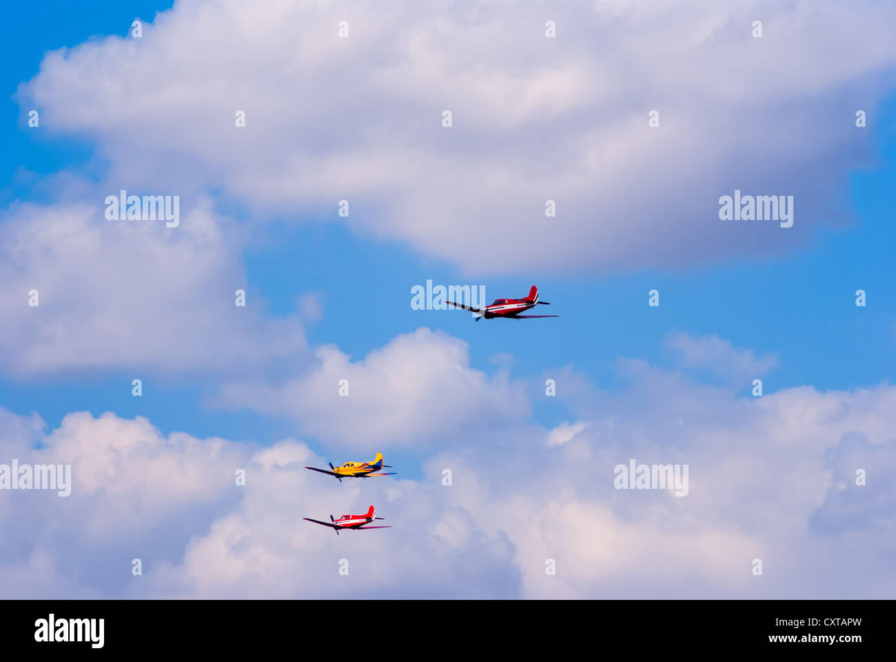 formation flying light training and commercial aircraft Stock Photo