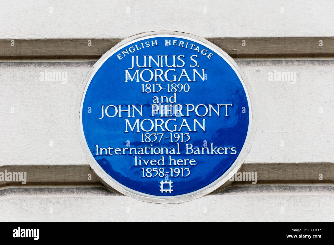 Blue plaque on premises occupied by Junius S. Morgan and John Pierpont Morgan in Princes Gate, Westminster, London. Stock Photo