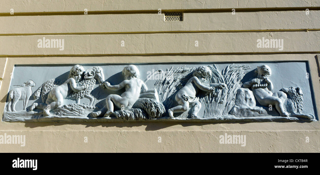 An eighteenth century Coade Stone frieze on the wall of the Norwegian embassy in Belgrave Square, London. Stock Photo