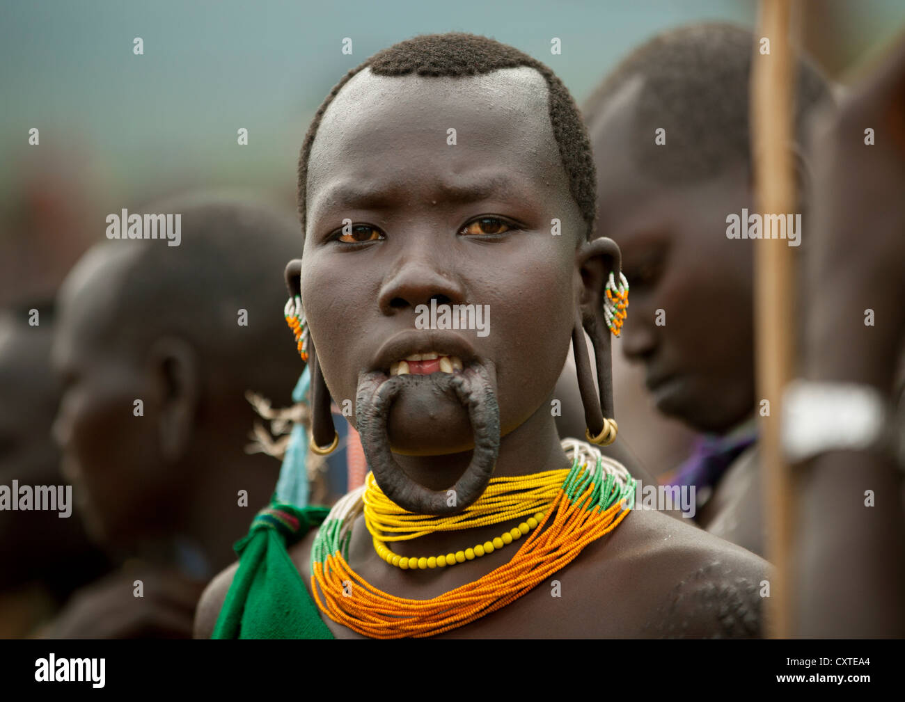 Suri Tribe Woman With Enlarged Lip At A ceremony organized by the  government, Kibish, Omo Valley, Ethiopia Stock Photo - Alamy