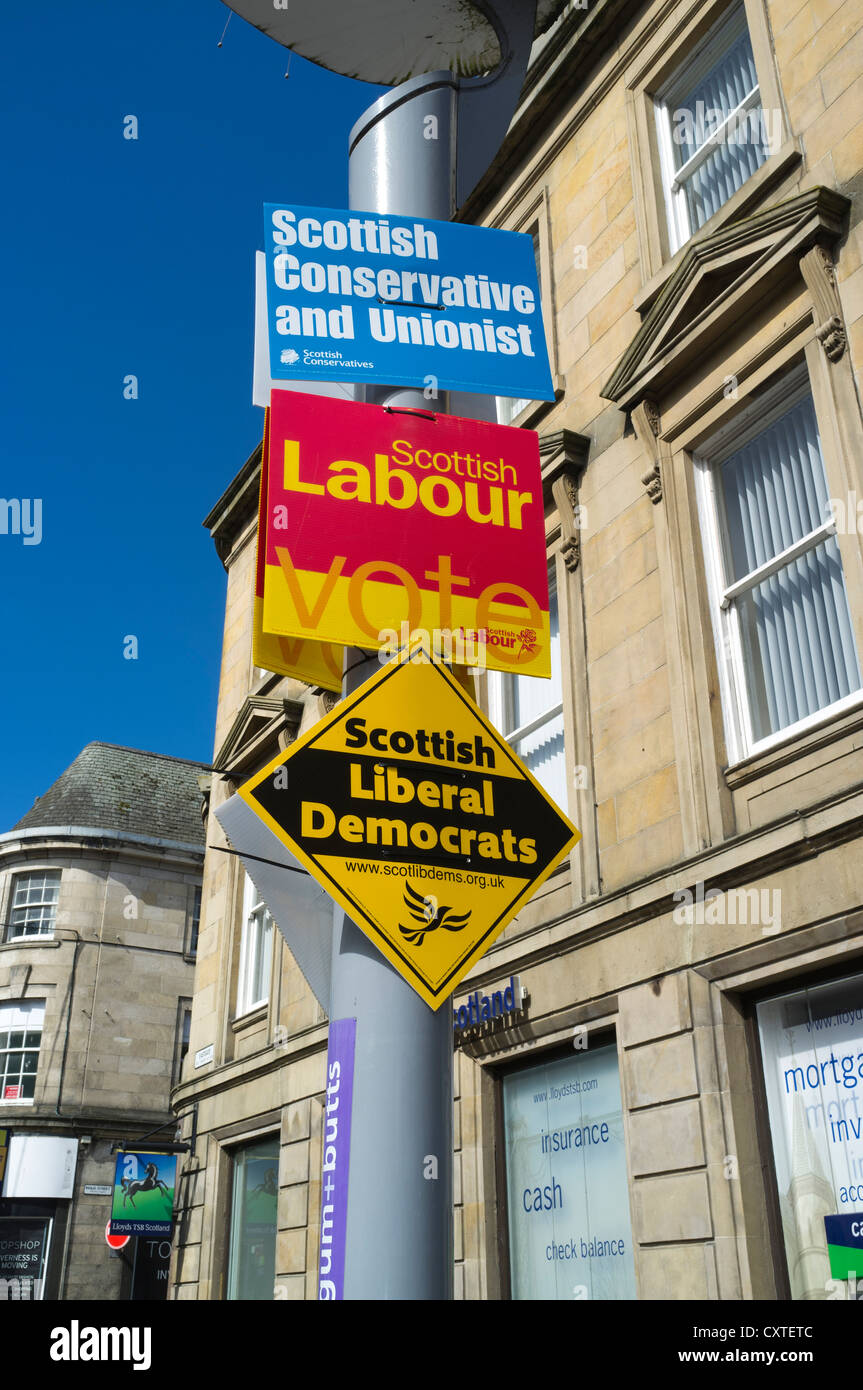 dh Scottish political parties POLITICS UK Posters Conservative Liberal Labour signs uk election Scotland campaign elections day Stock Photo