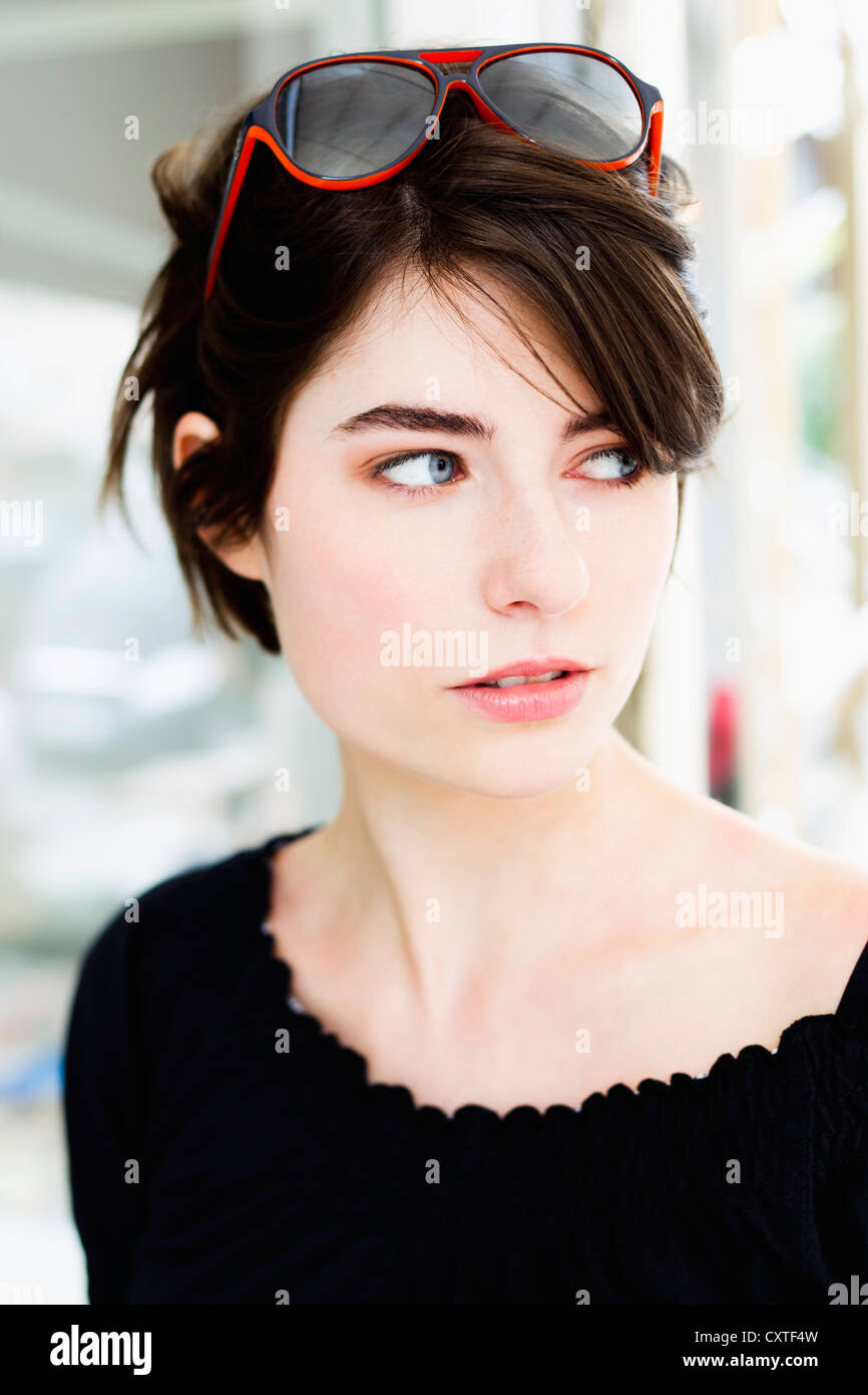Close up of woman wearing sunglasses Stock Photo - Alamy