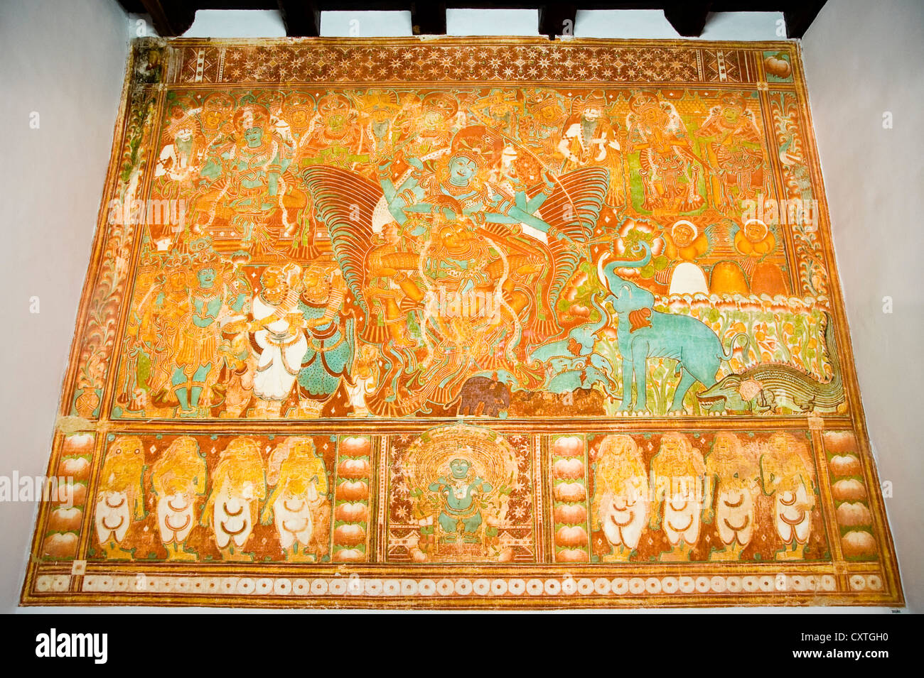 Horizontal close up of the Gajendra Moksham mural, the largest single panelled mural ever found in Southern India. Stock Photo