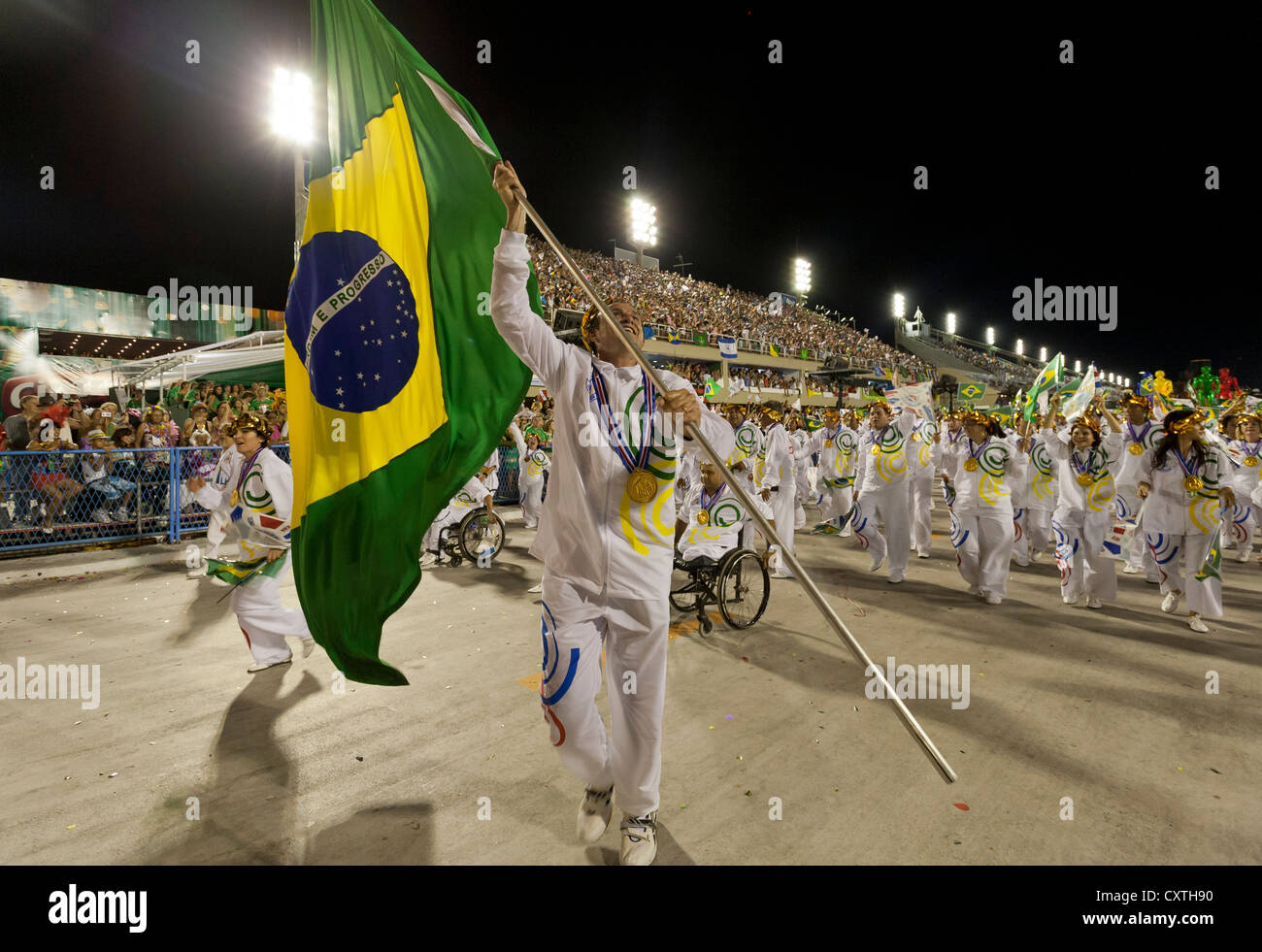 Man with Brazilian Flag while celebrating the Olympics During Carnival Rio de Janeiro Brazil Stock Photo