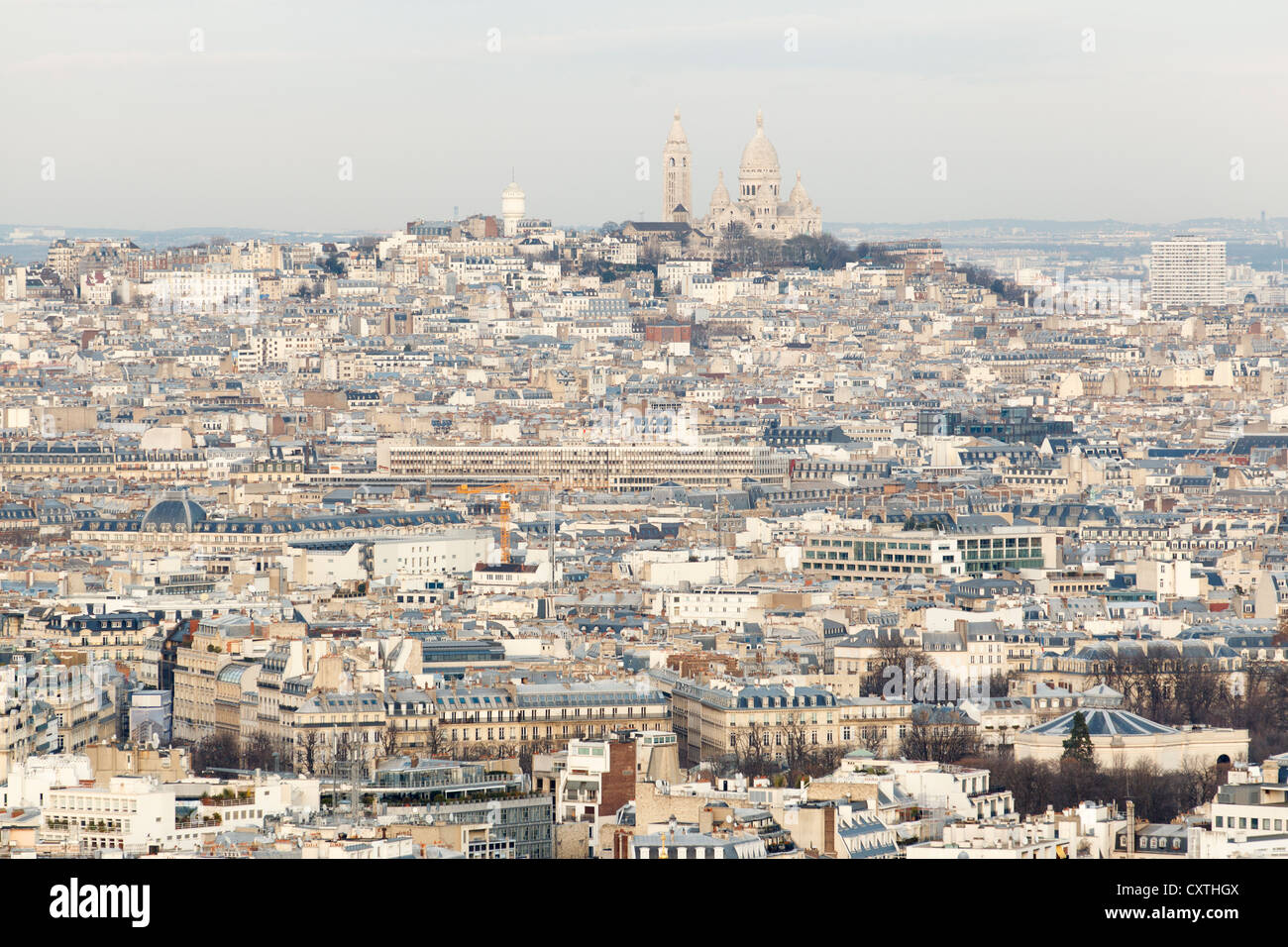 View of Paris from the Eiffel tower, to the background the Sacré Coeur basilic. Montmatre, Paris, France Stock Photo