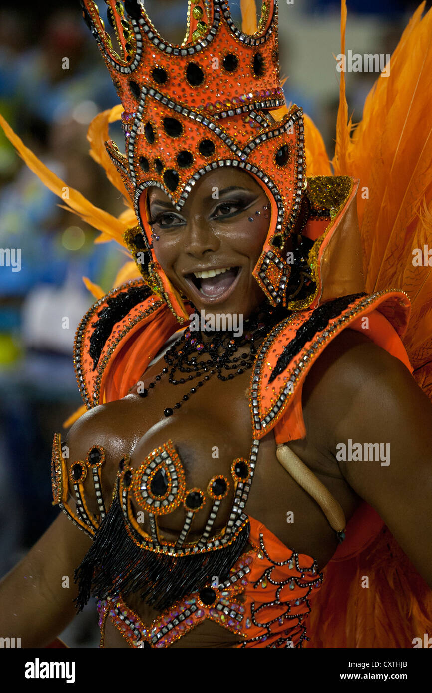 Woman in Bright  Orange Costume During Carnival Parade Rio de Janeiro Brazil Stock Photo