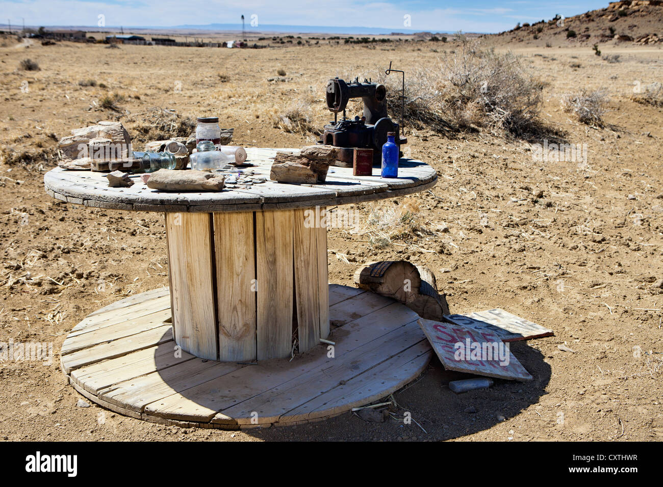 Makeshift yard sale table with junk on it Stock Photo Alamy