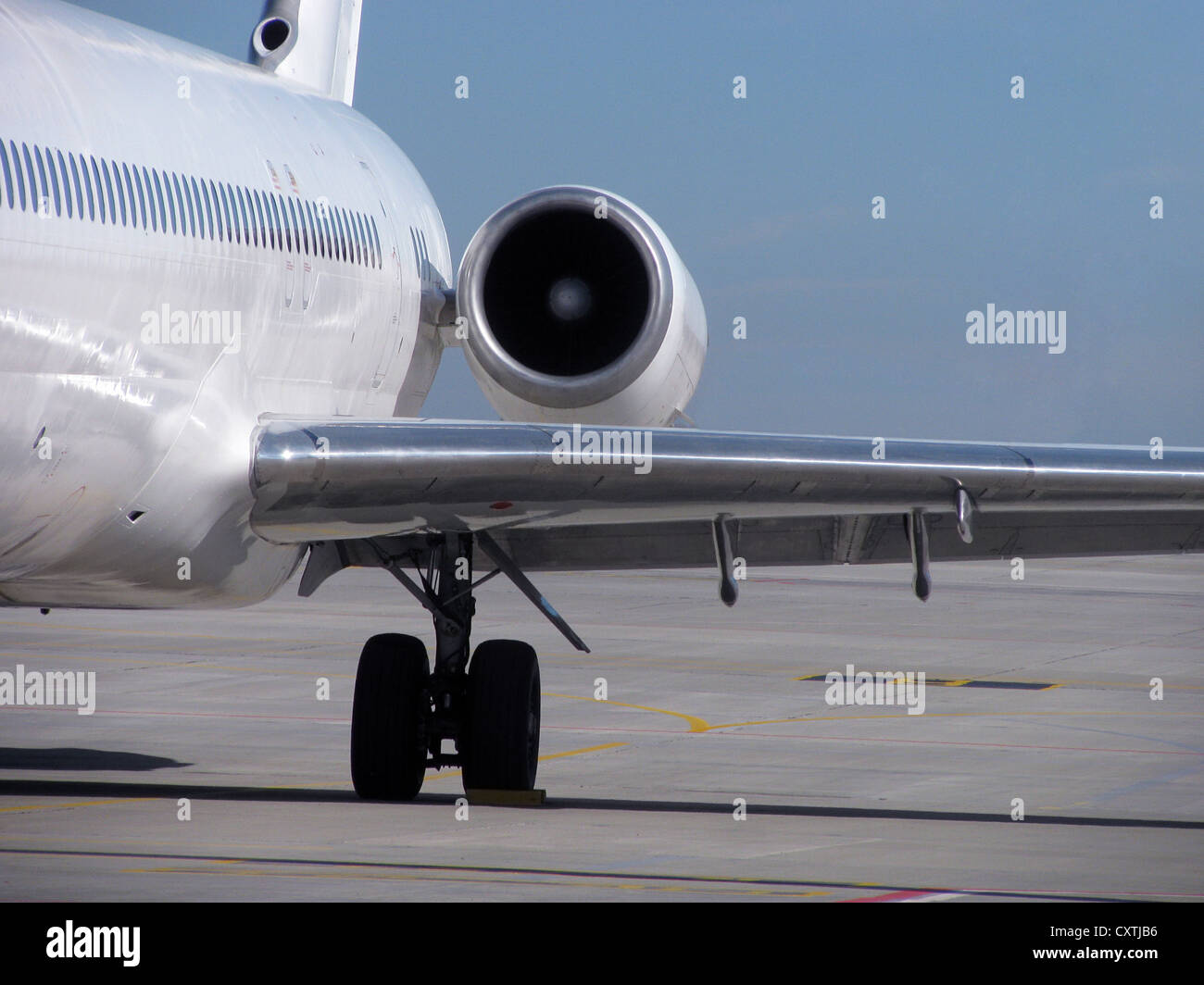 turbine engine of airplane standing in airport Stock Photo